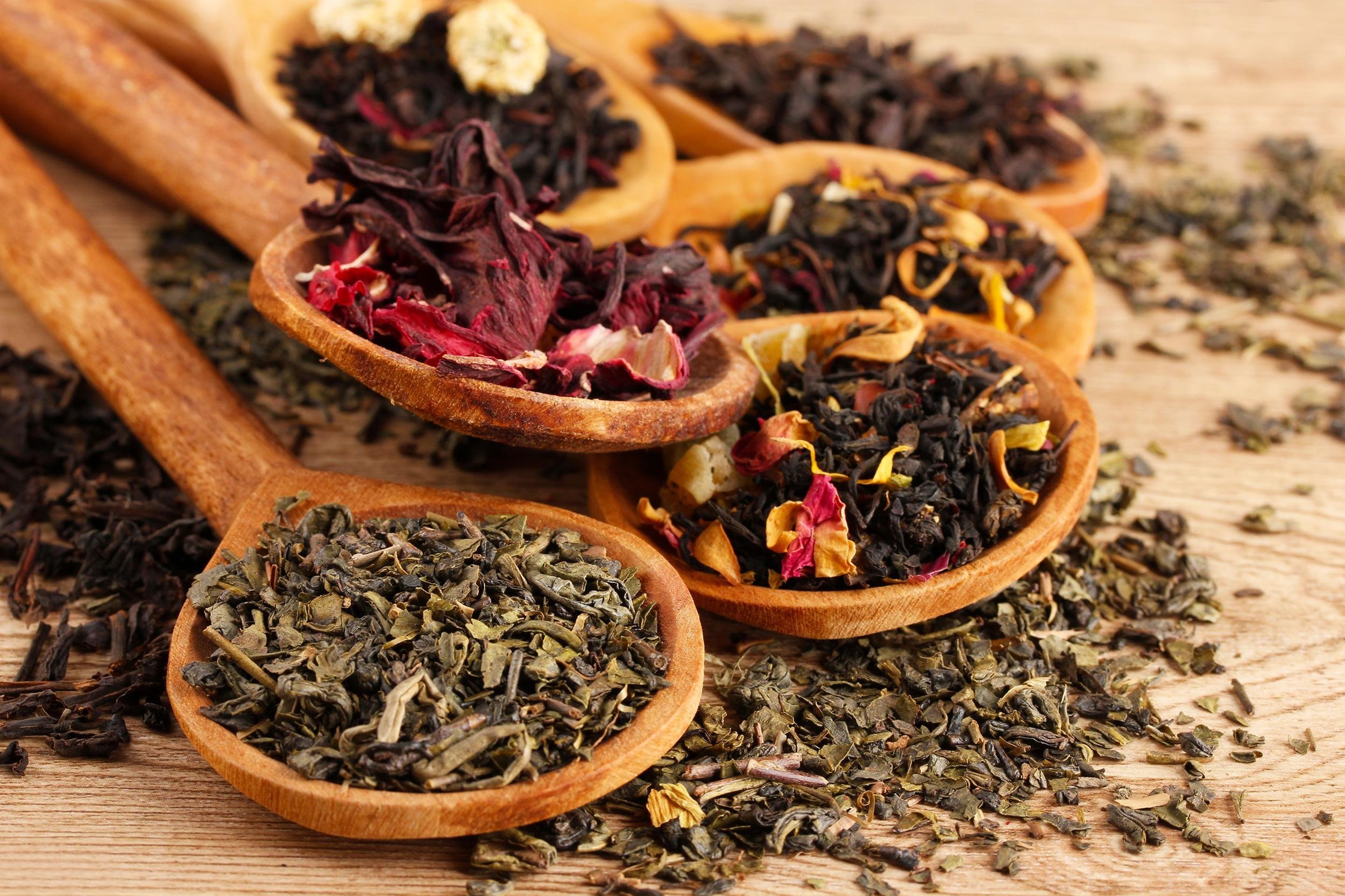 assortment of dry tea in spoons