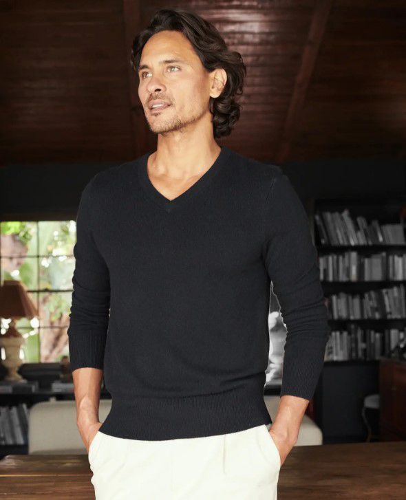 Man wearing black Mongolian cashmere sweater from Quince