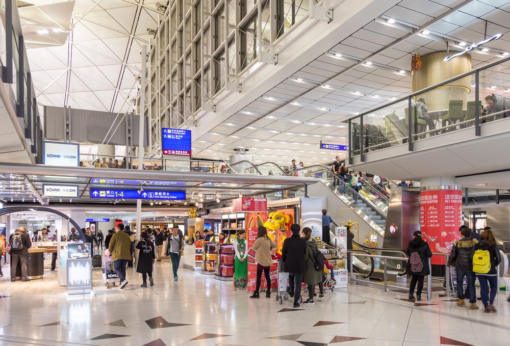 Hong Kong, China - January 24, 2016: Duty free shops in departure hall at Chek Lap Kok International Airport.