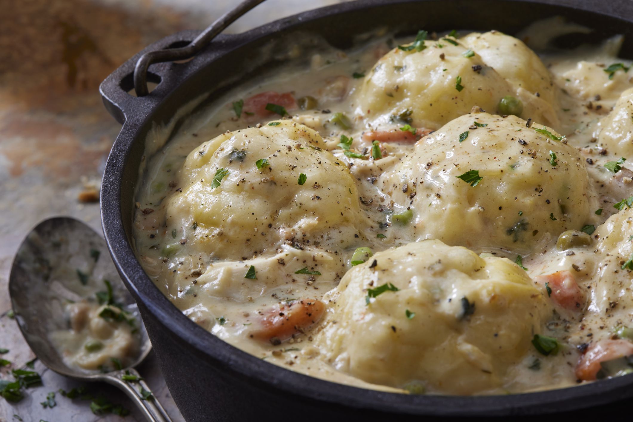Creamy Chicken and Dumplings with Roast Chicken, Green Peas, Celery and Carrots