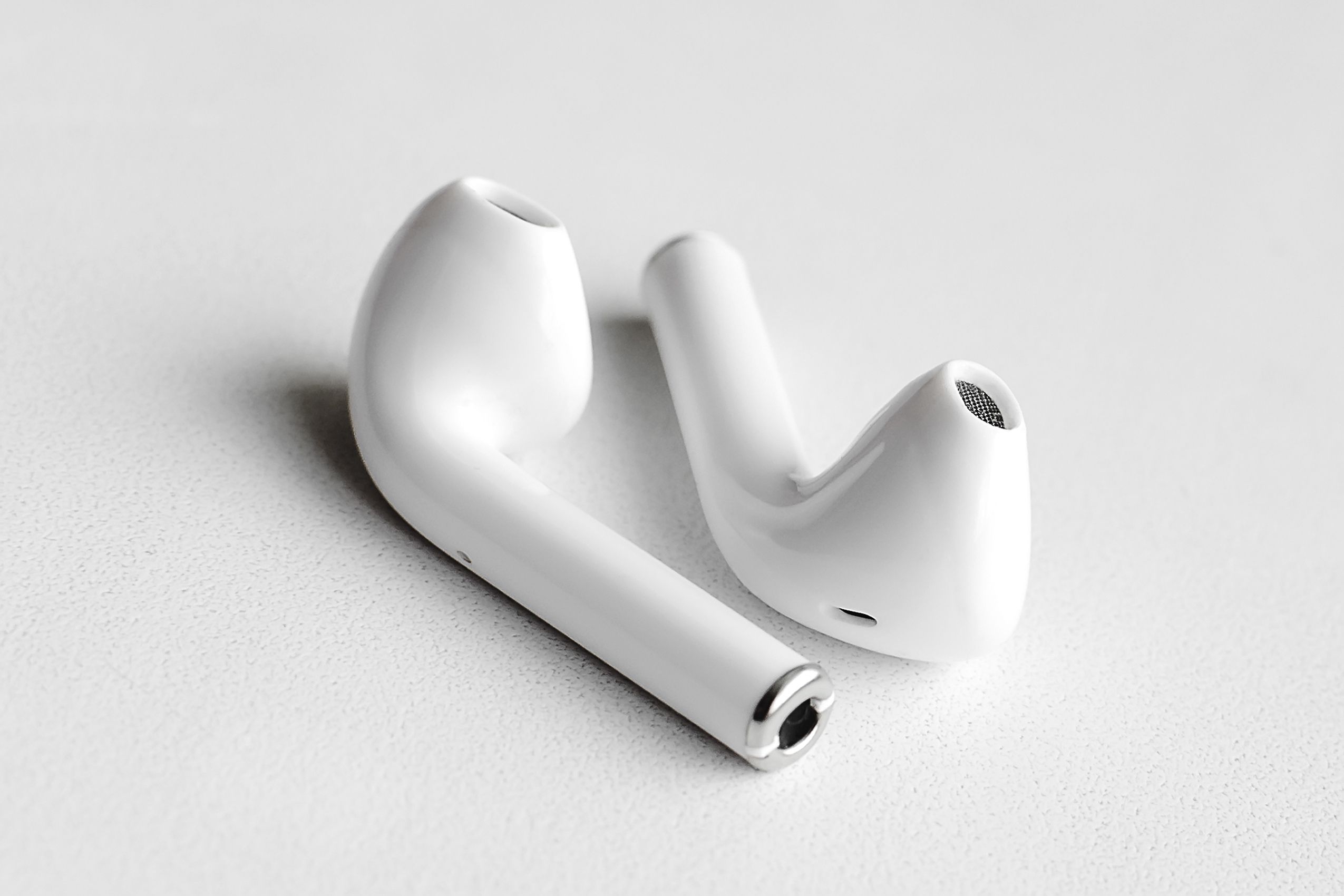 Wireless headphones on a white background, Close-up. The concept of modern technology.