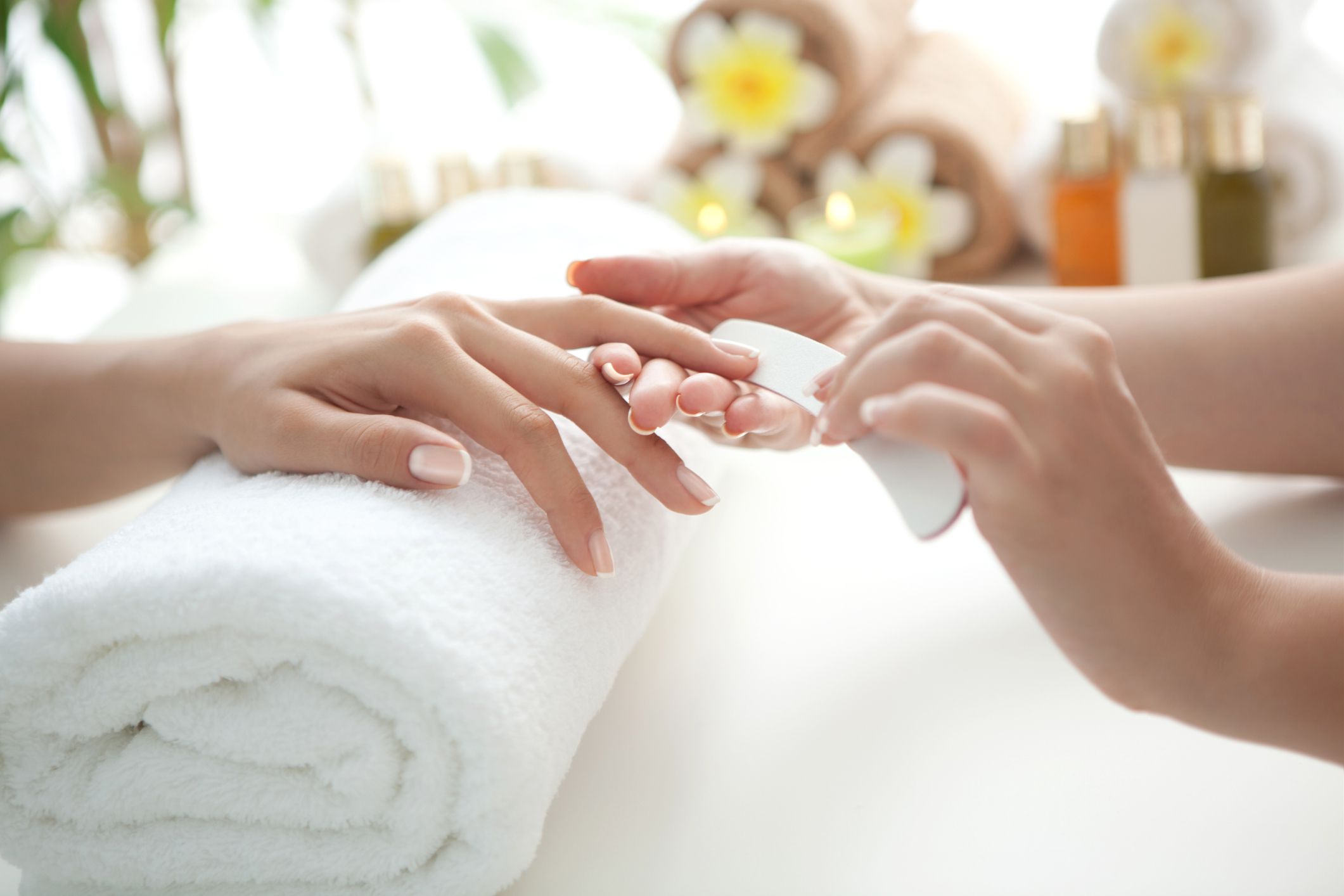 Close up of beautiful female hands having manicure treatment.See more MANICURE and SPA images. Click on image below for lightbox.
