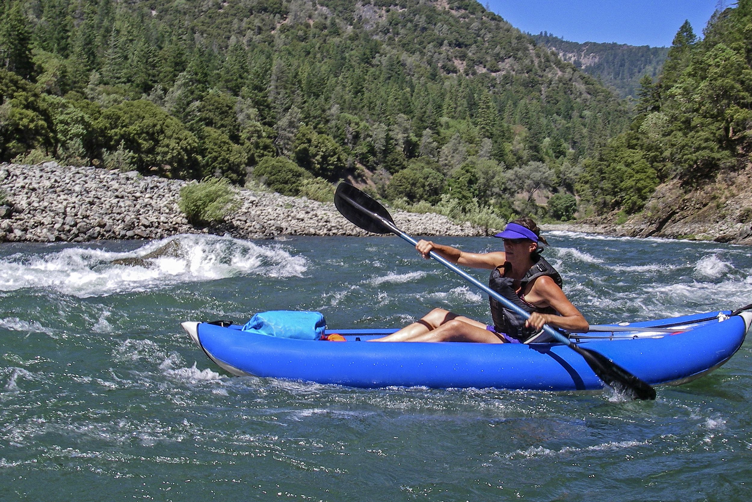 woman kayaking in the Smith River, California