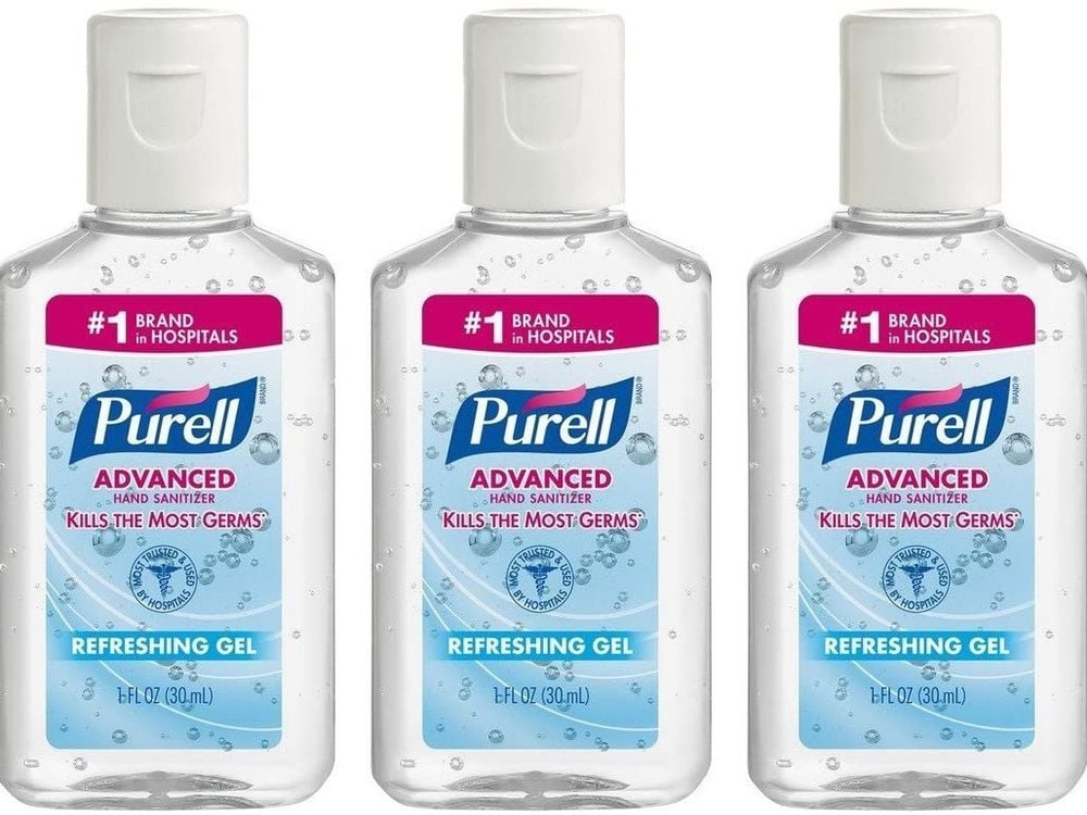 Three bottles of Purell Advanced Hand Sanitizer Refreshing Gel, each 1 fl oz, are arranged side by side. The labels indicate it is the number one brand in hospitals and kills the most germs.