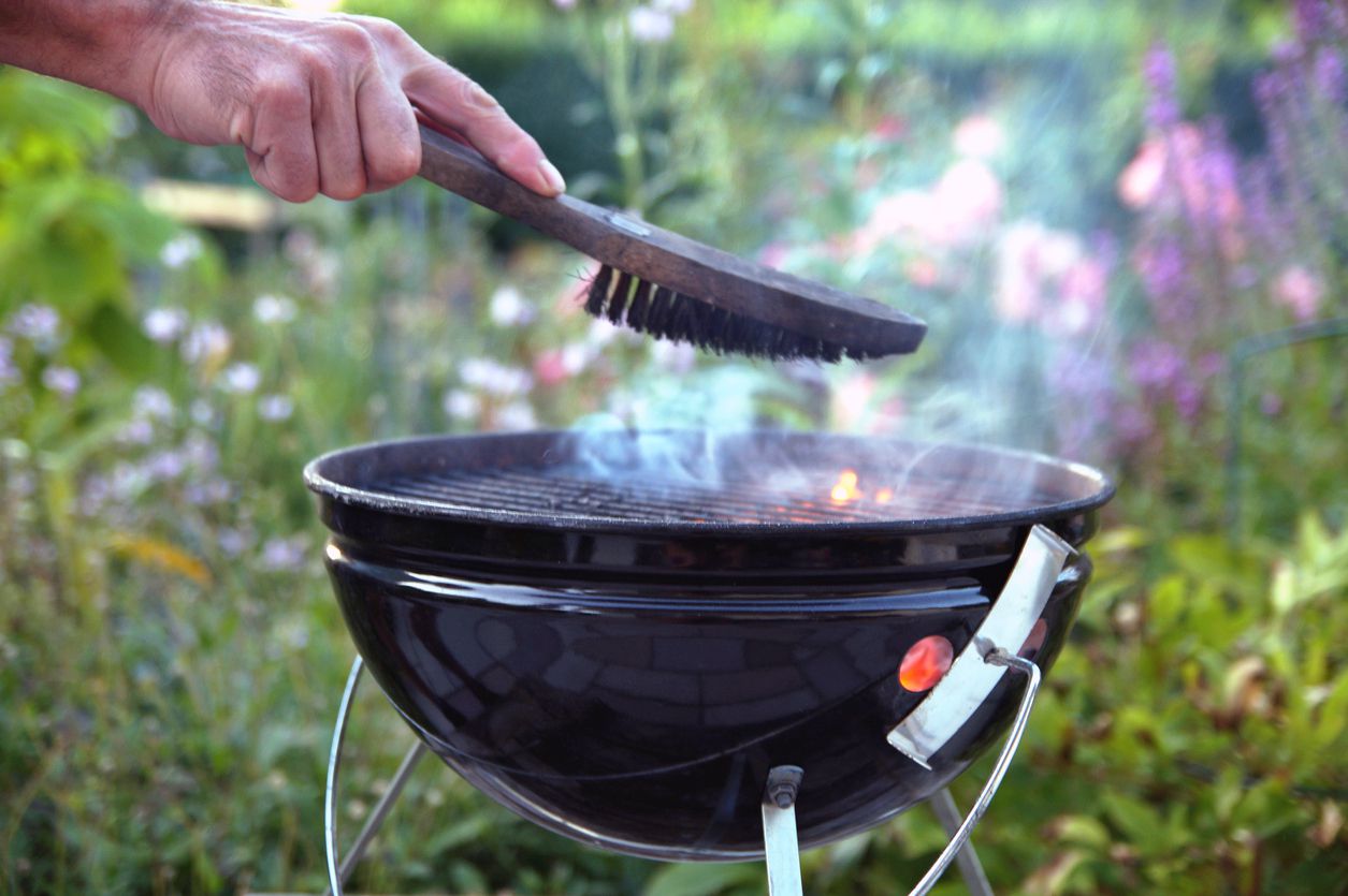 wire brush over hot charcoal grill
