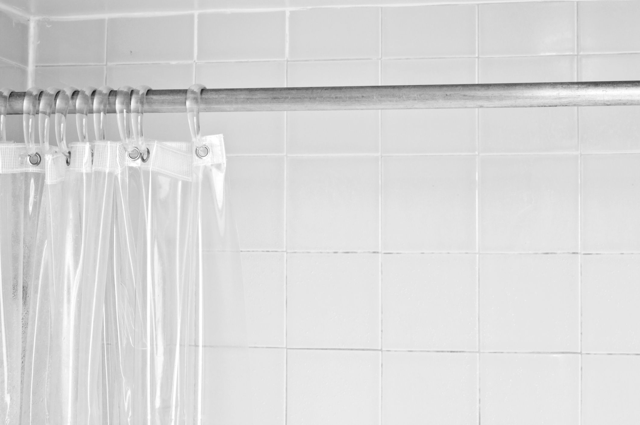 Shower curtain in a shower.