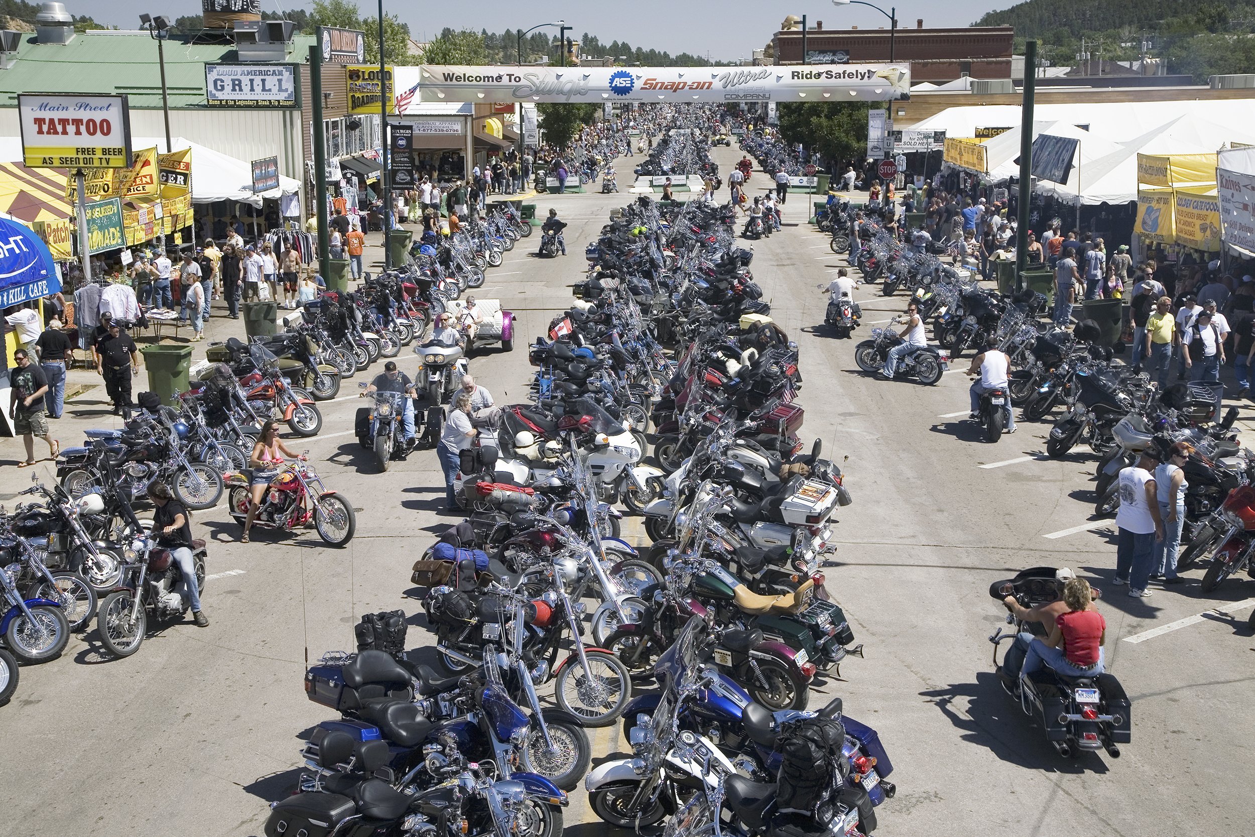 motorcycles lining road at the 67th Annual Sturgis Motorcycle Rally in Sturgis, South Dakota