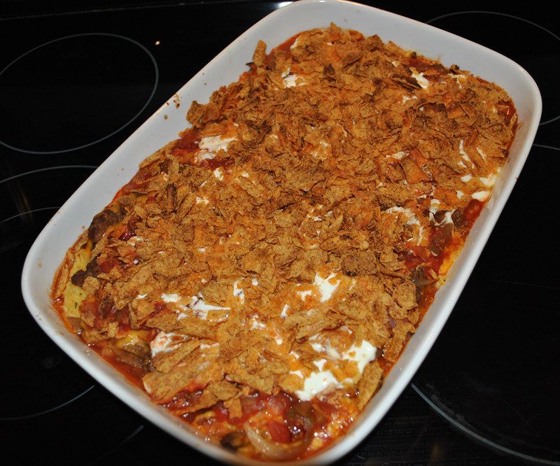 Doritos casserole with plenty of cheese and chips on top