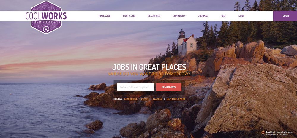 A scenic coastal landscape with a lighthouse on rocky cliffs, pine trees, and calm water at sunset. The CoolWorks website header is overlaid, featuring a search bar for jobs and navigation menu at the top.
