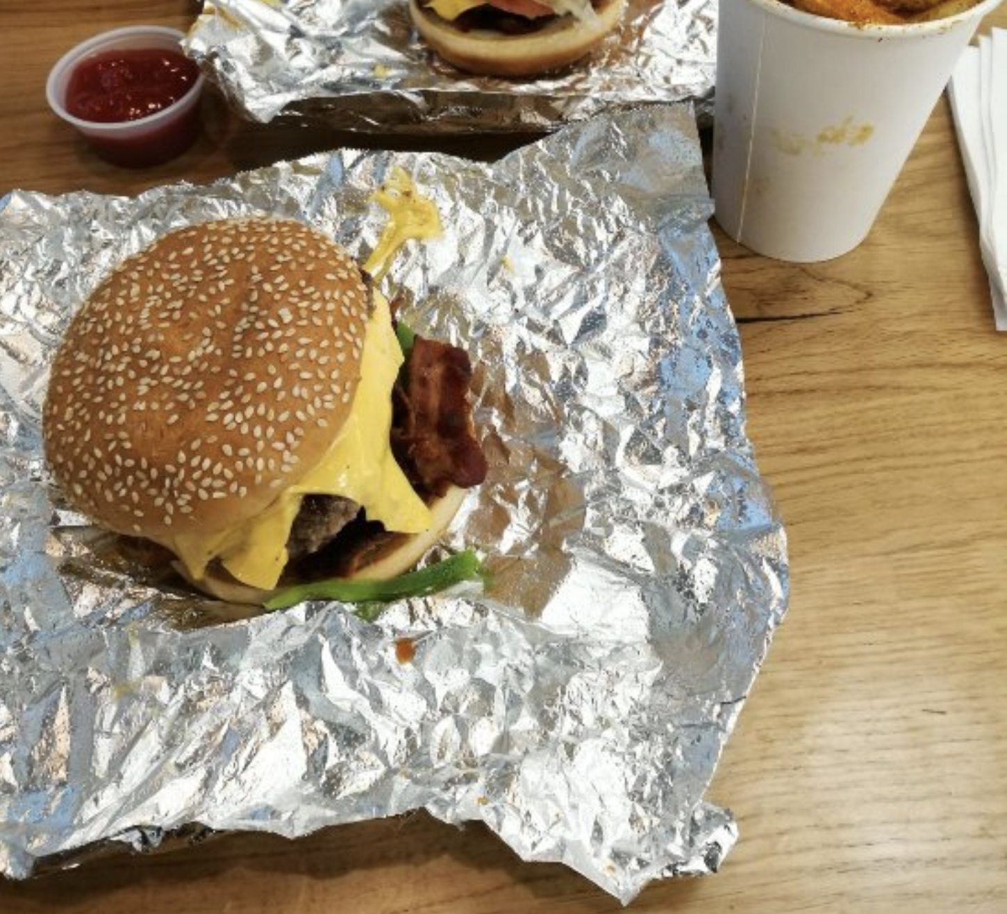 Close up image of Five Guys Bacon Cheeseburger