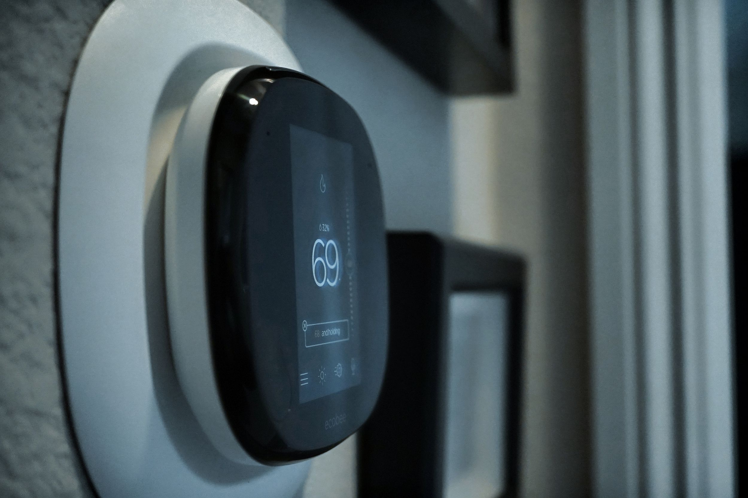 set thermostat on wall of home