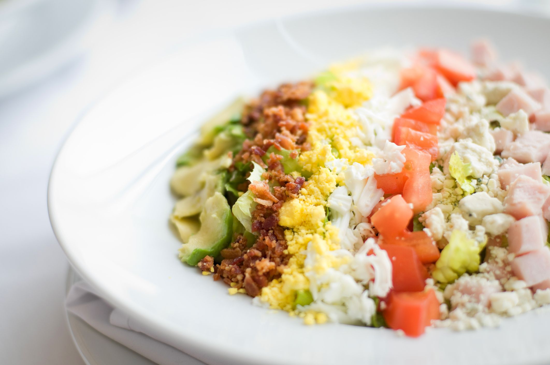 A Cobb salad beautifully presented-- Shallow Depth of Field