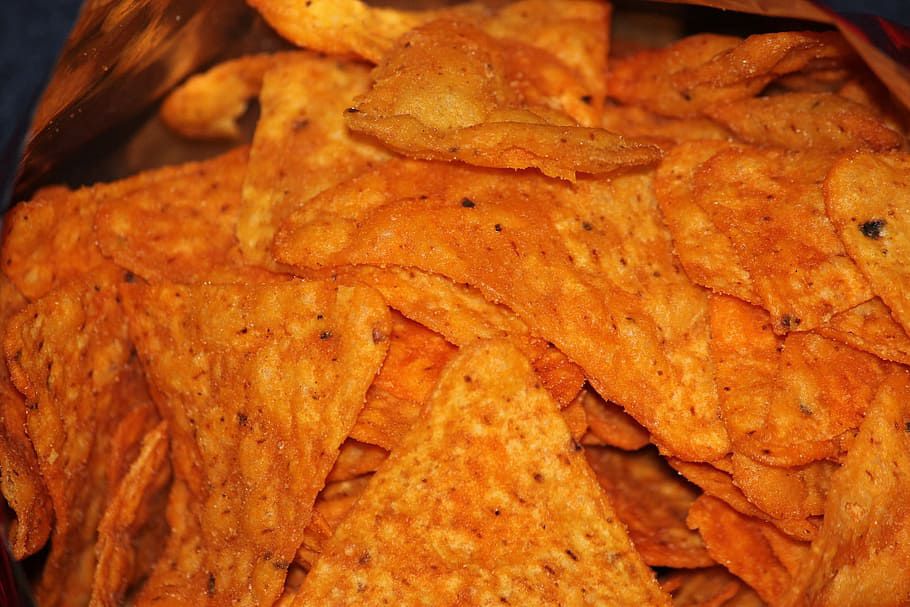 Close up image of Doritos nacho cheese chips