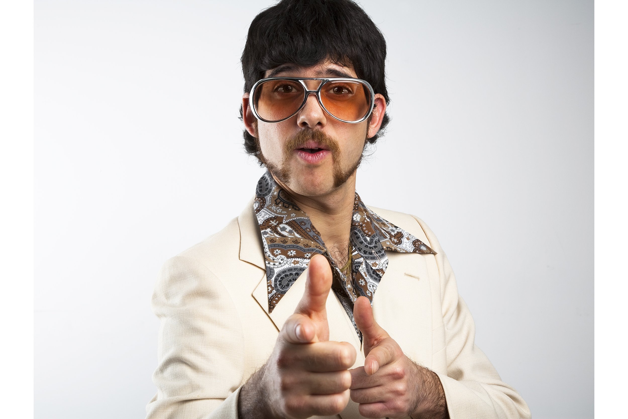 Man wearing a wide-collared leisure suit