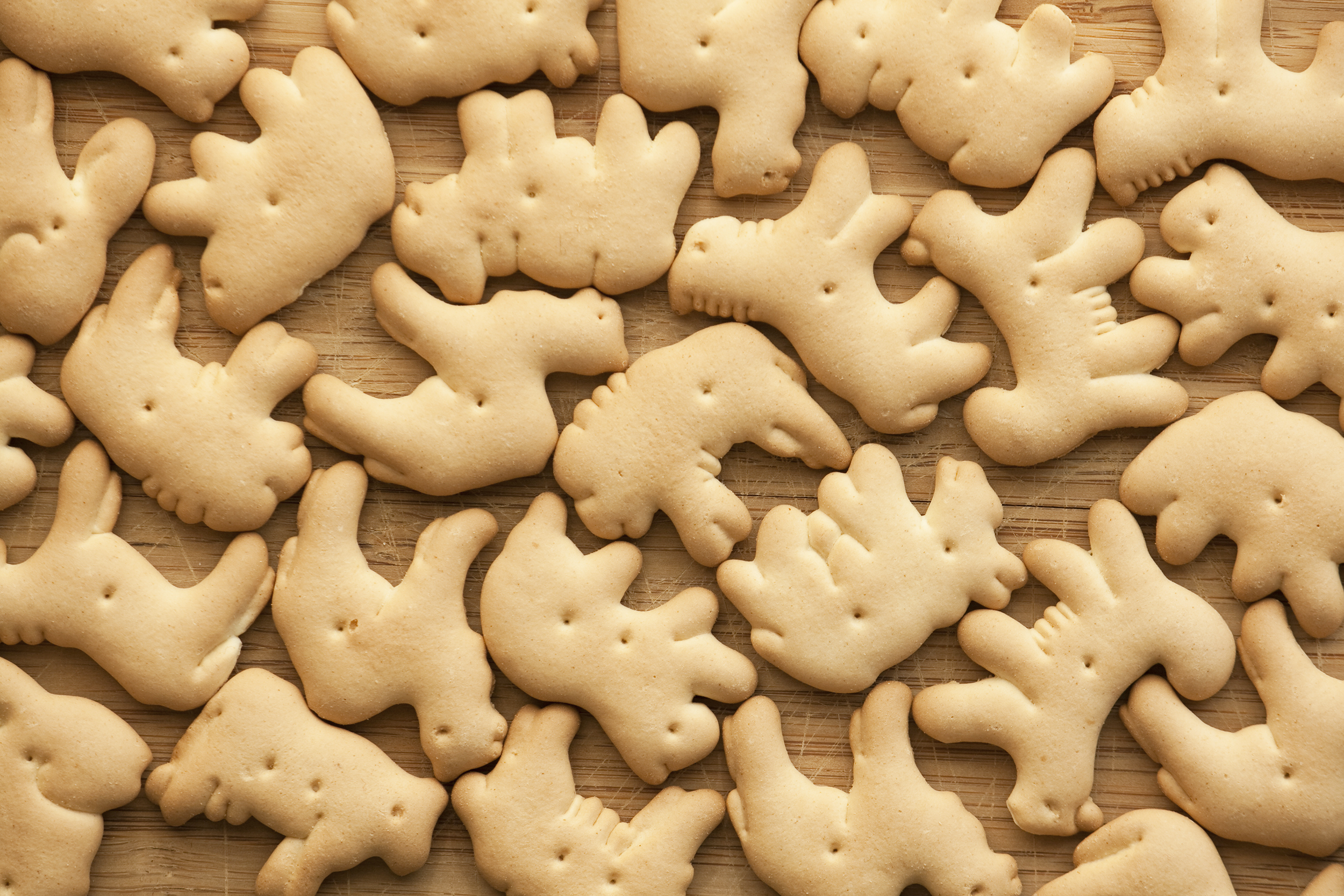 Closeup of animal crackers on a wooden table