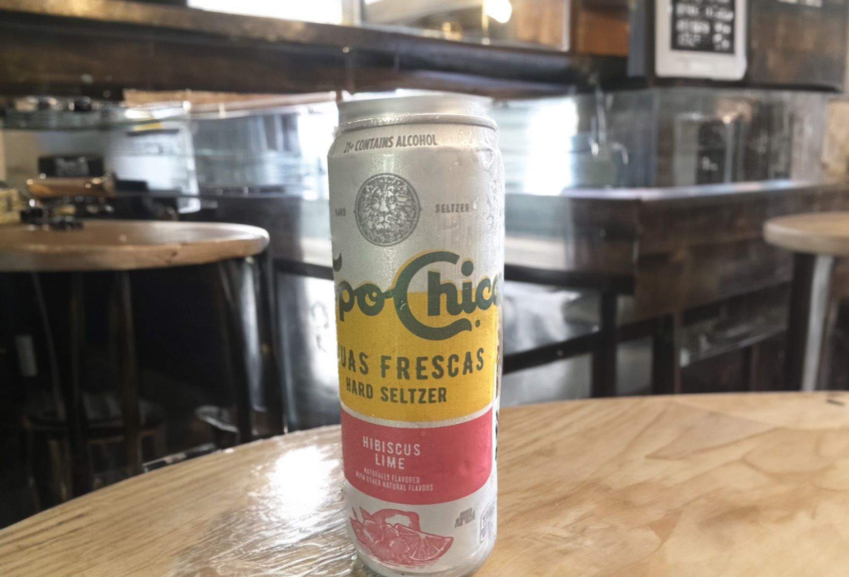 Hibiscus Lime Topo Chico on a bar