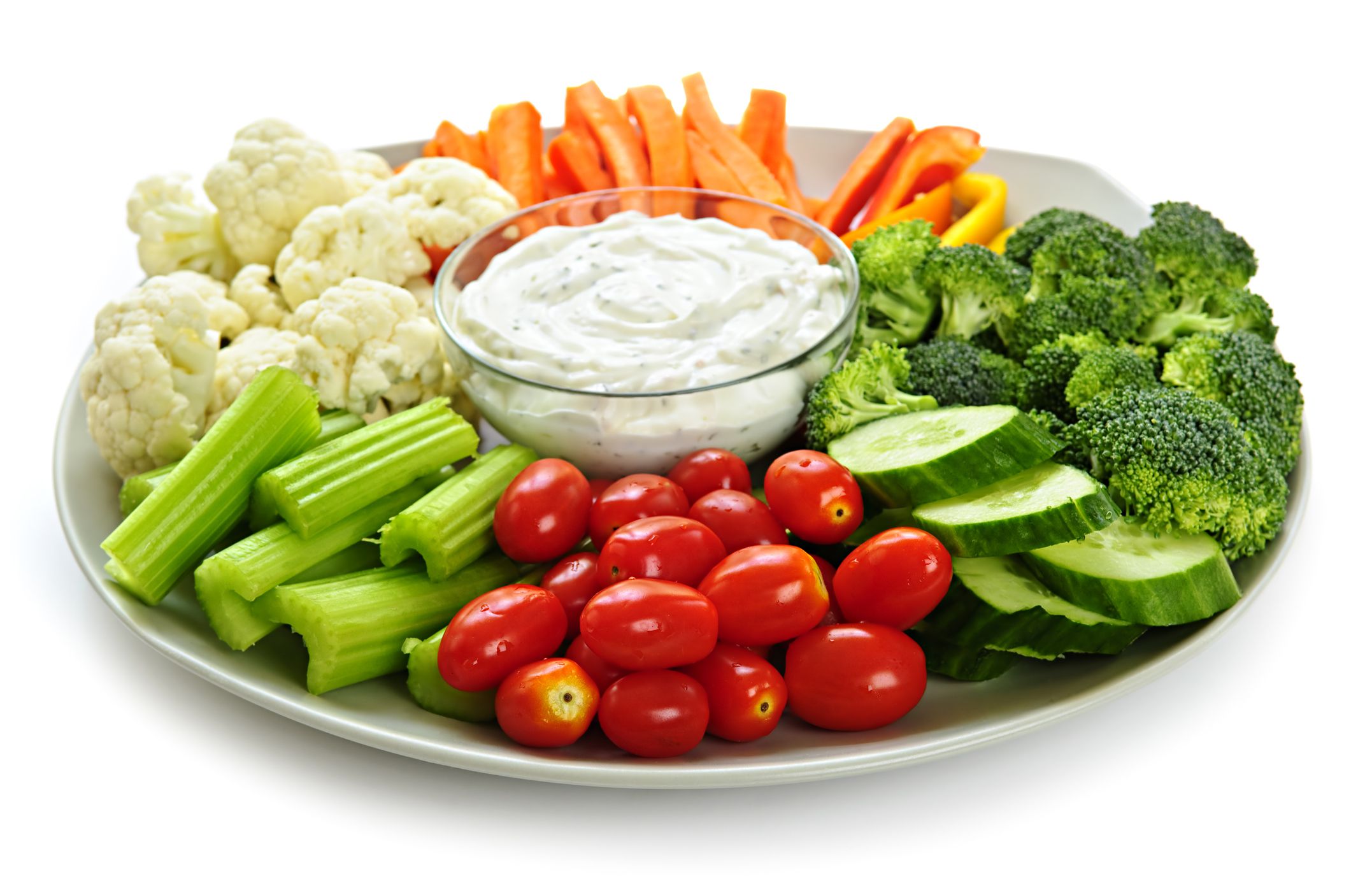 Platter of assorted fresh vegetables with dip