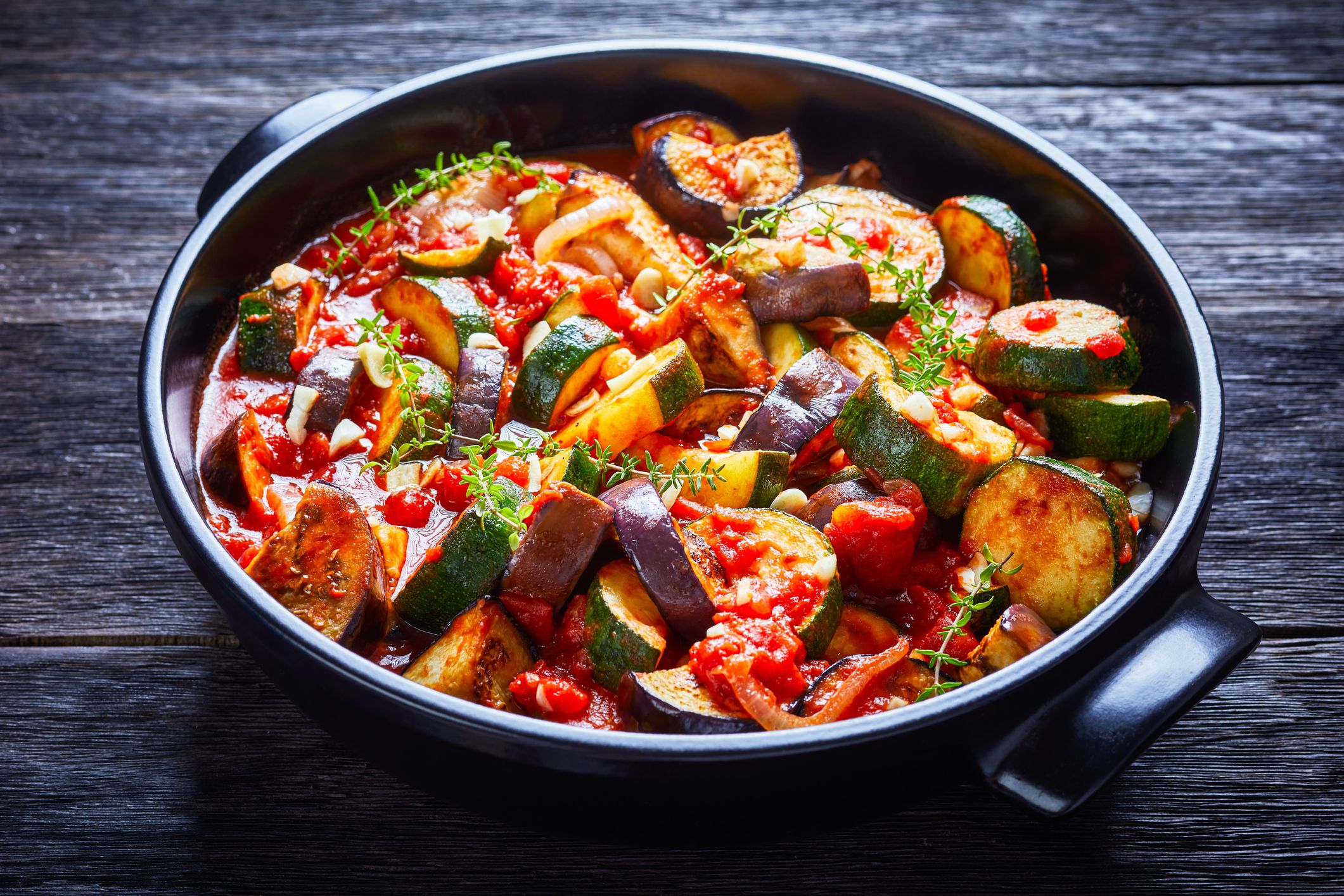 veggies ragout in a black ceramic dish