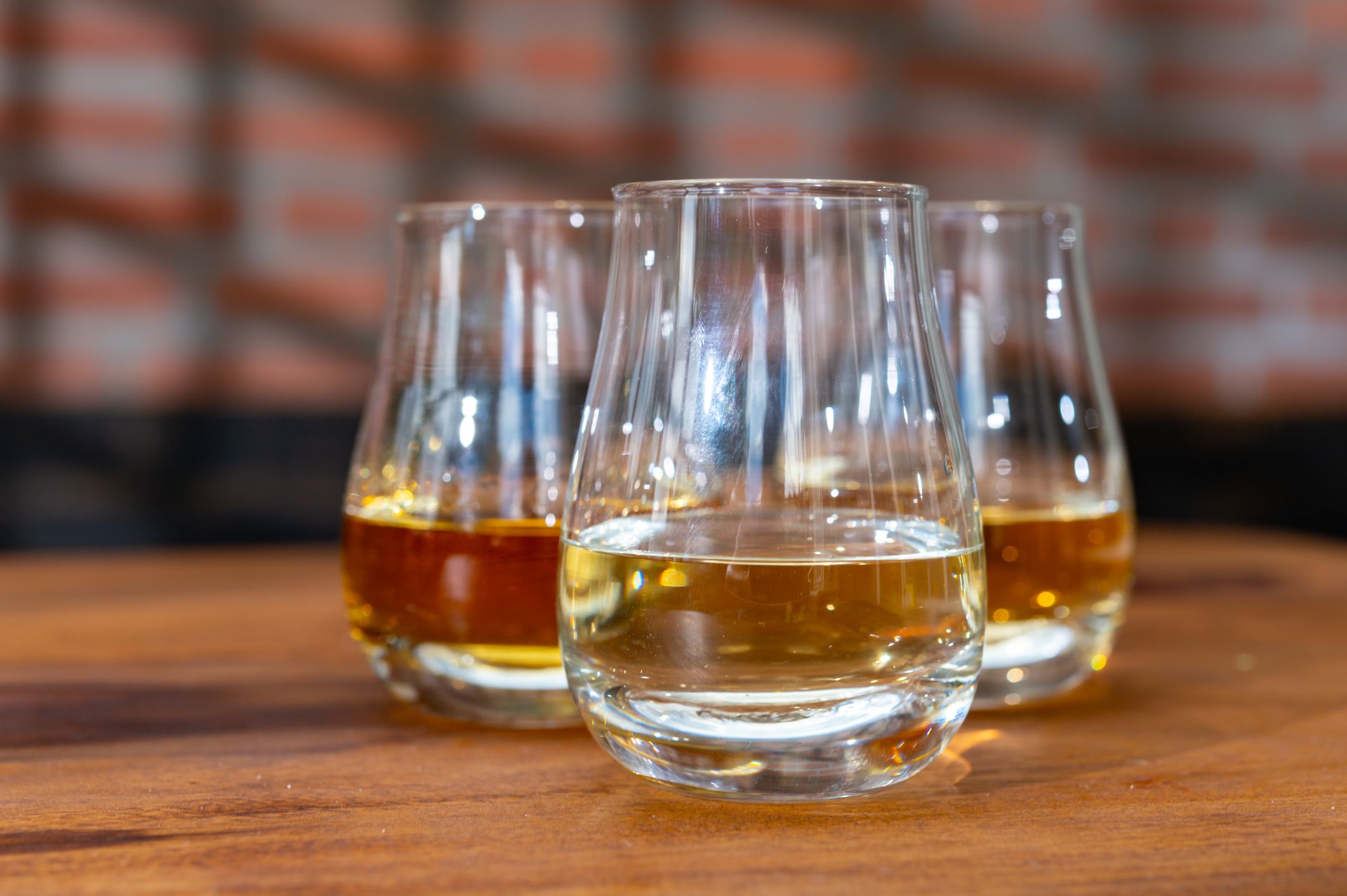Tasting of Scotch whisky in traditional old house with shadow from wooden British windows