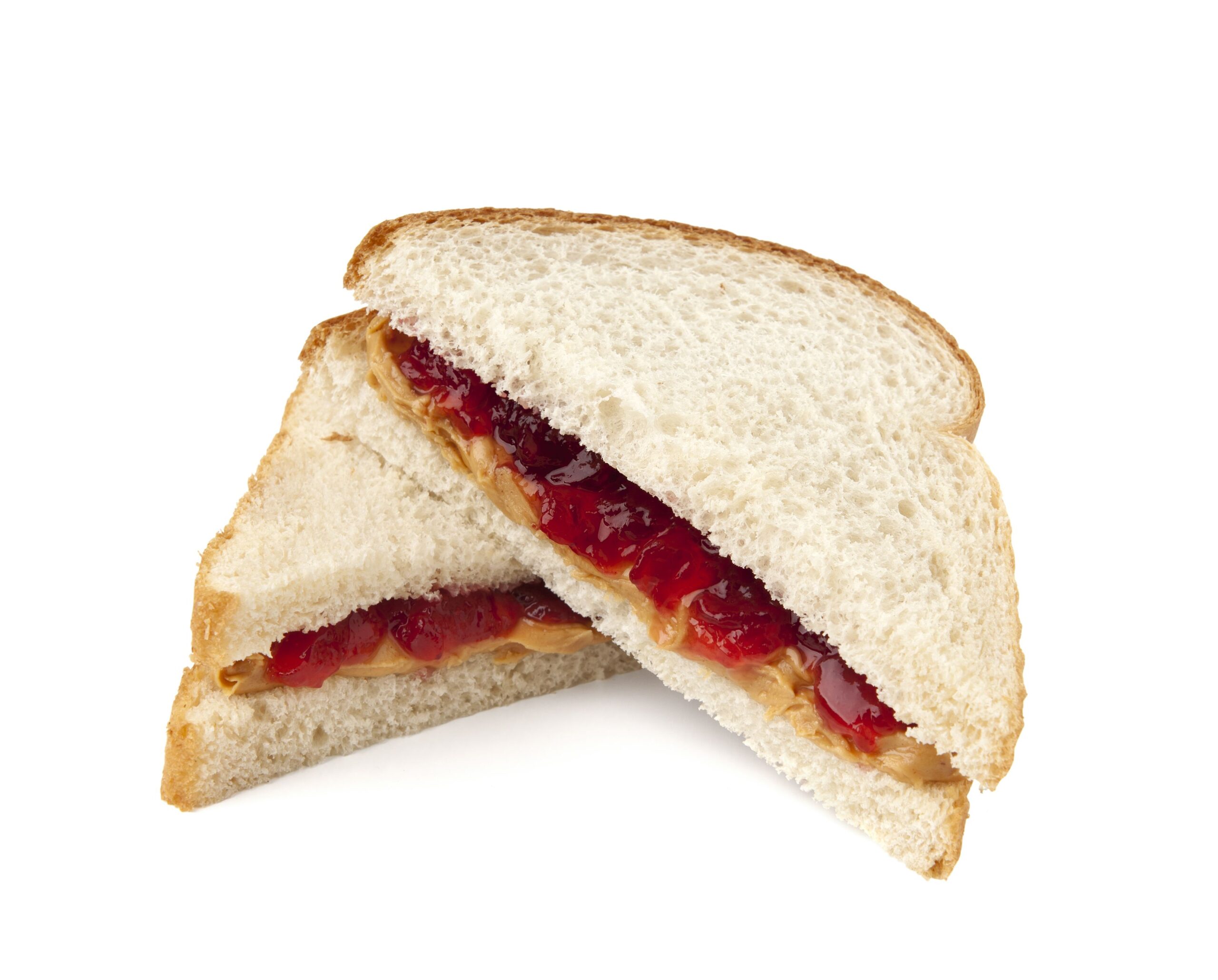 Peanut butter and jelly sandwich with clipping path on white background. Please see my portfolio for other food and drink images.
