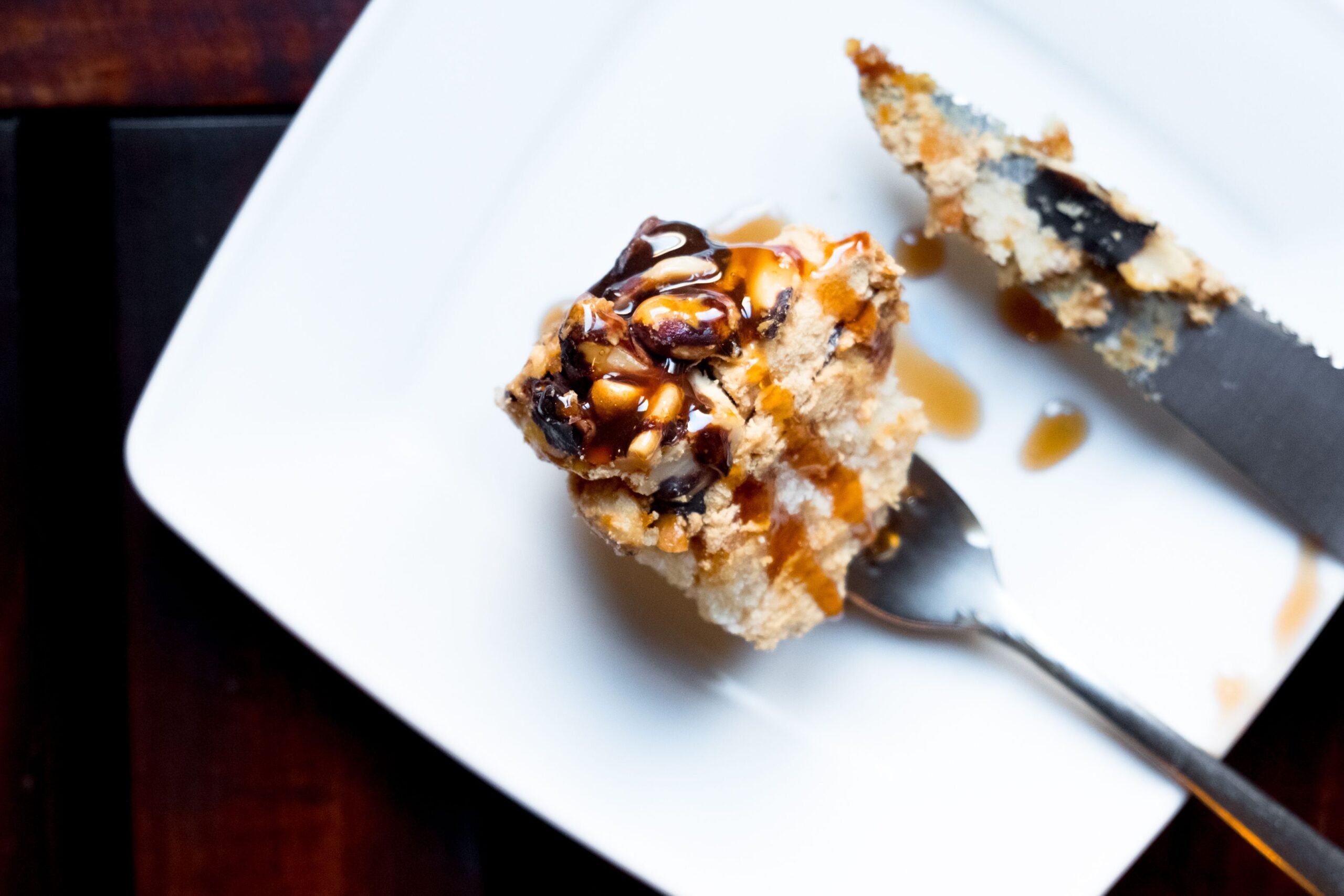 Cake with walnuts and honey on plate. Top view
