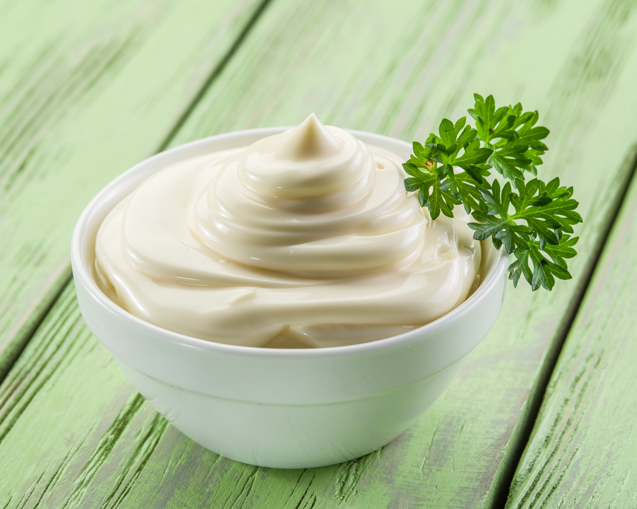 mayonnaise in the white bowl