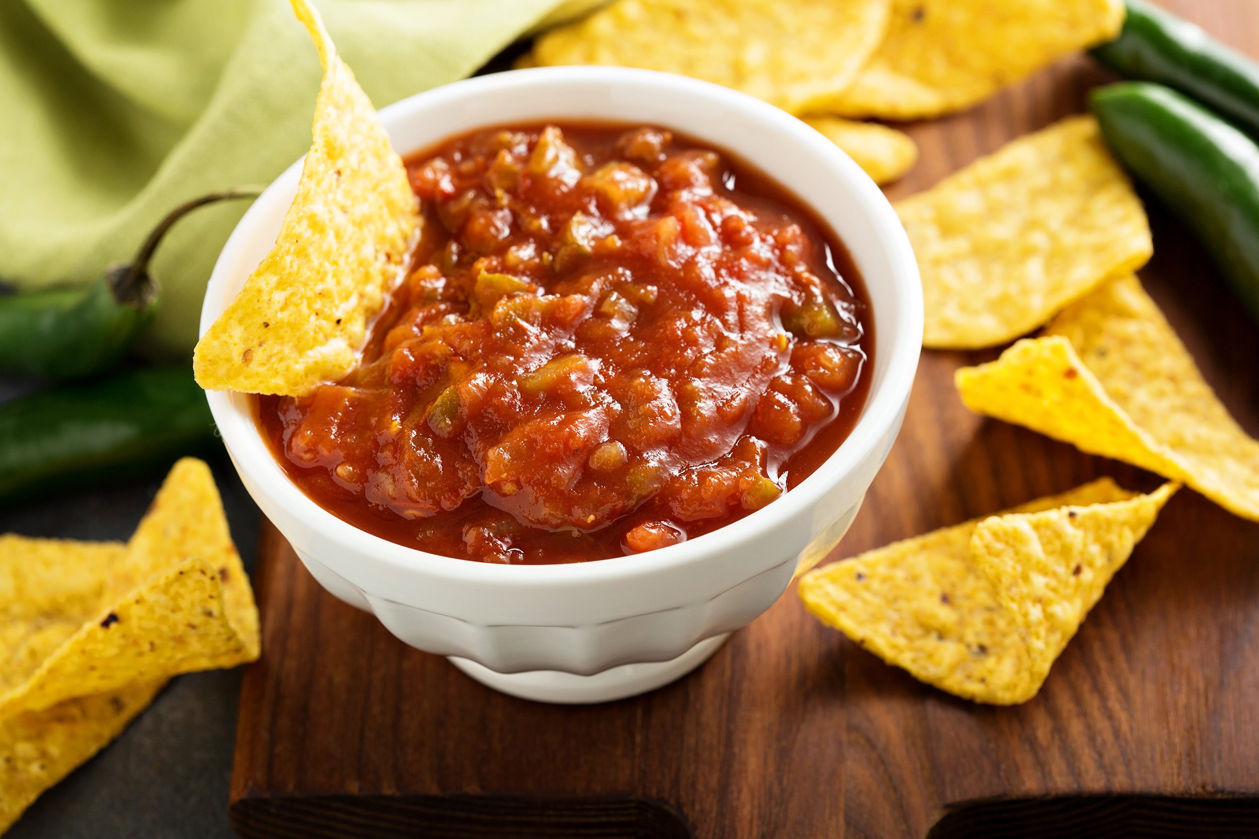 red tomato spicy salsa with chips