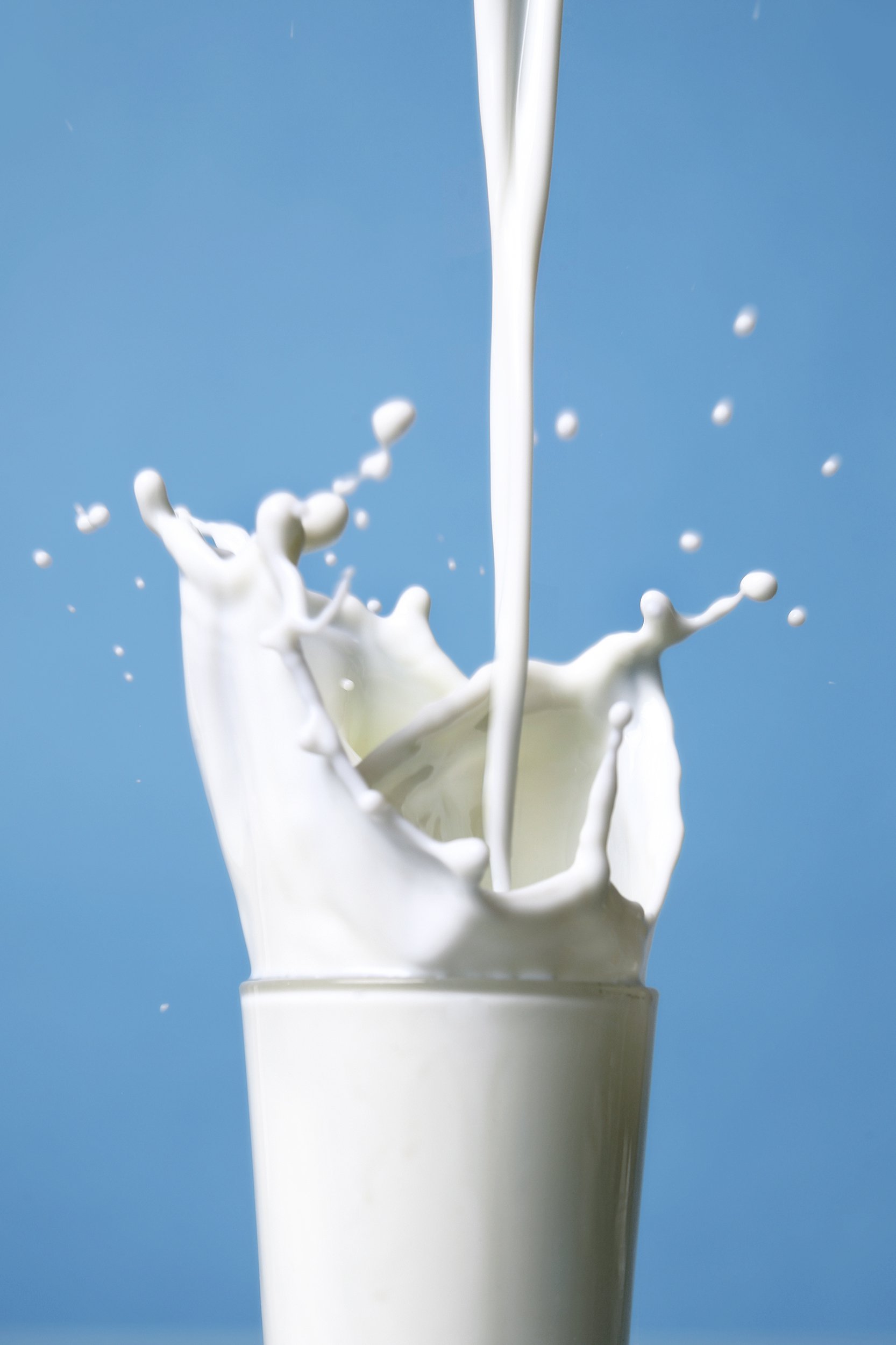pouring milk into glass