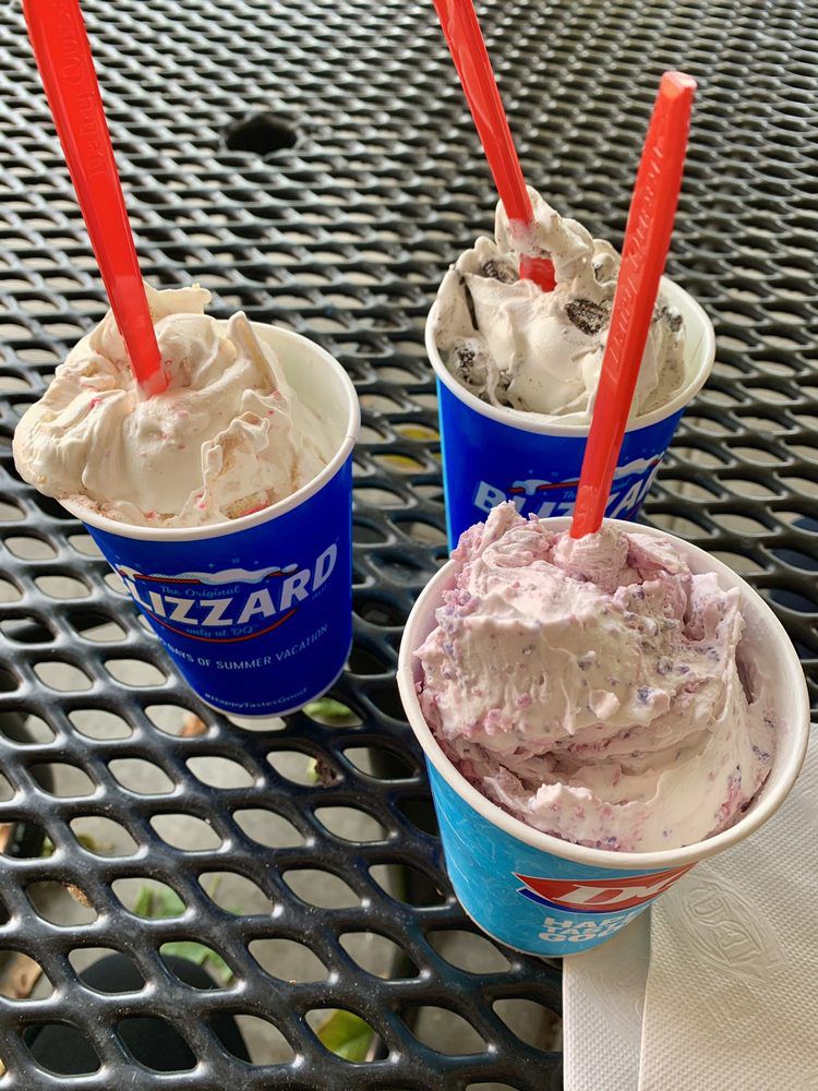 Three Dairy Queen blizzards with red straws