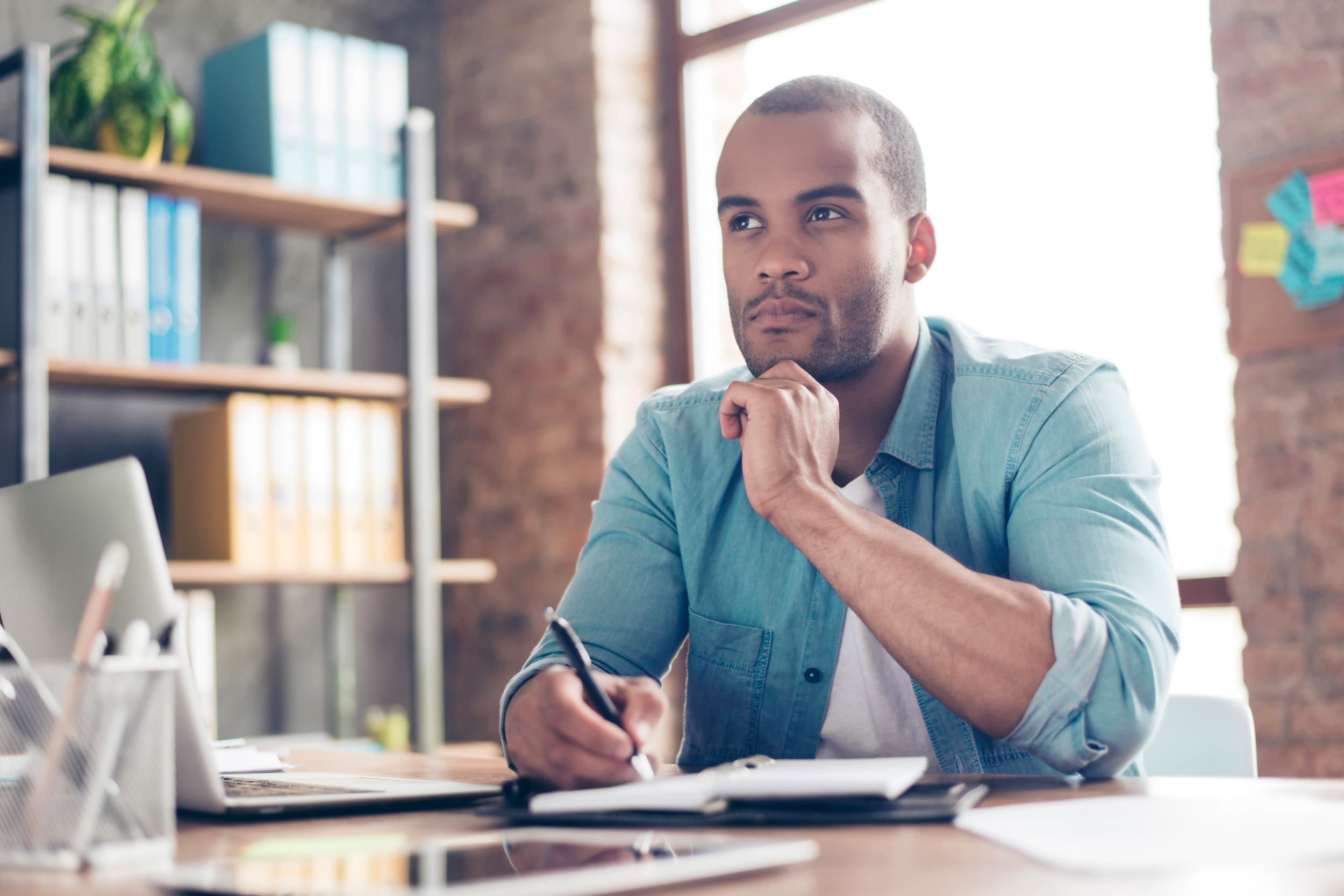 Man thinking at his desk