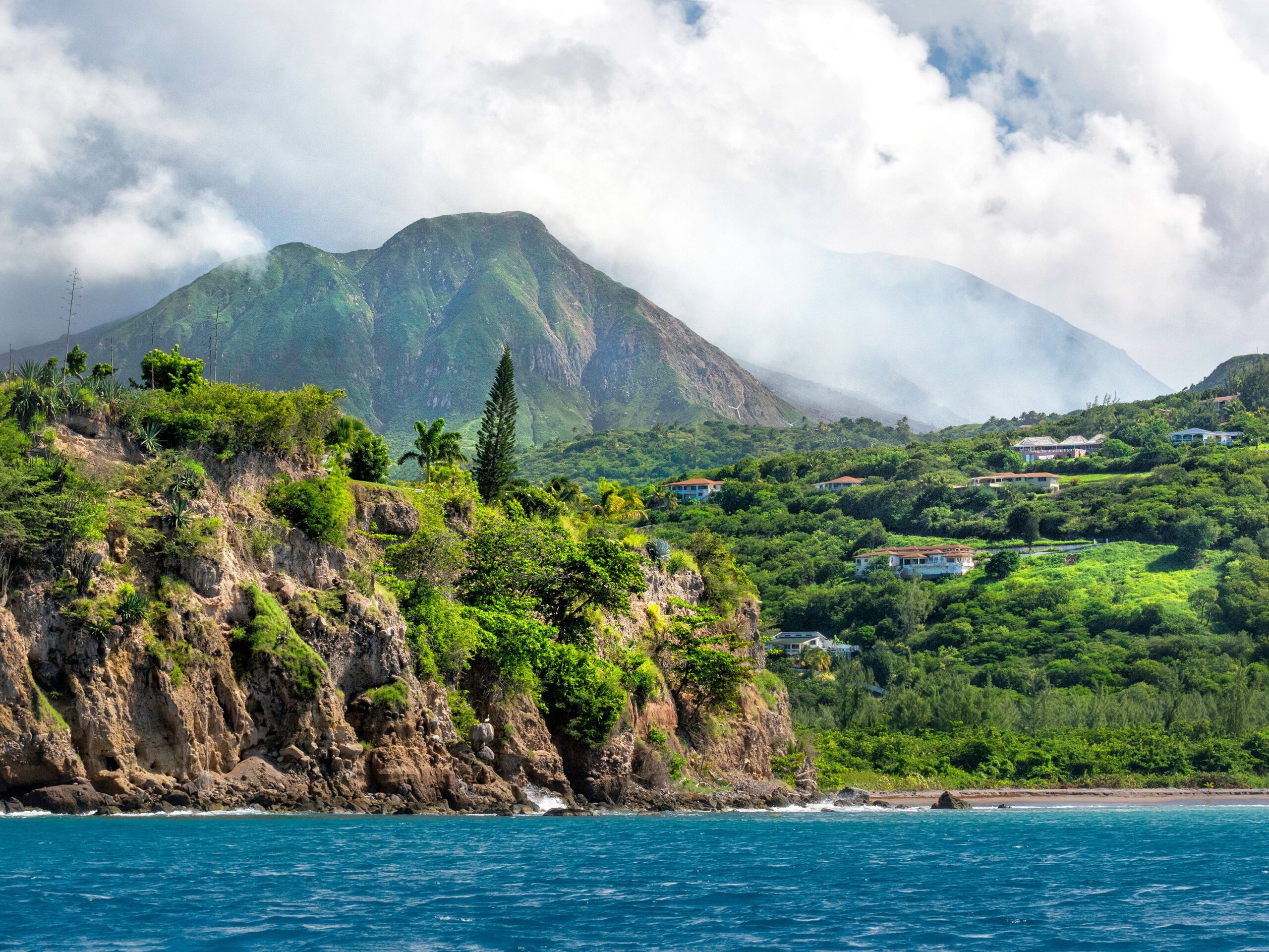 Series of eruptions of Soufriere Hills volcano between 1995 and 1999 devastated capital town Plymouth and several other villages. The zone is restricted until today, and buildings in that area are covered in volcanic flow of mud, ash, and rocks. Plymouth
