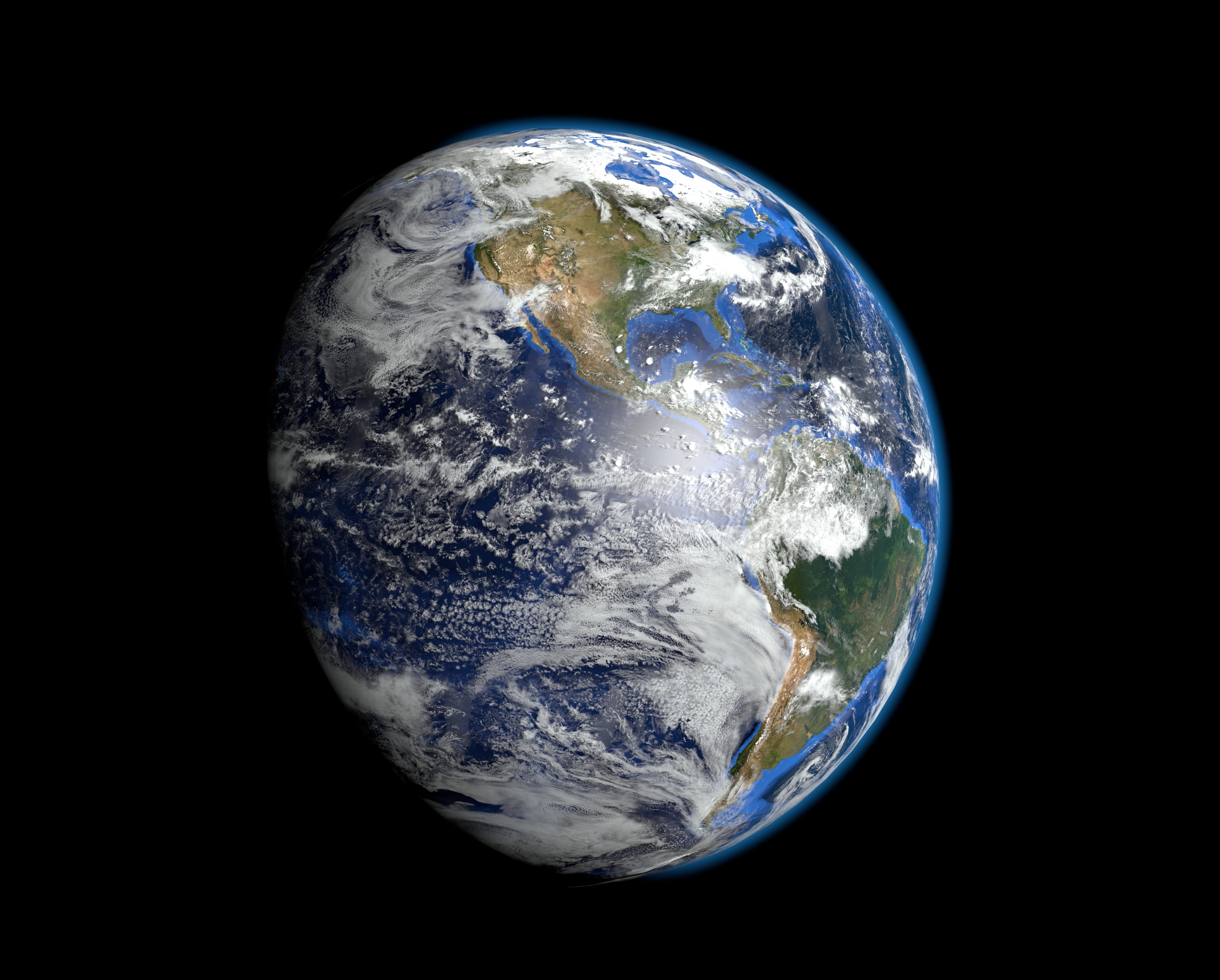 Planet earth from outer space showing North and South America and part of the Pacific Ocean with lots of clouds against a black background