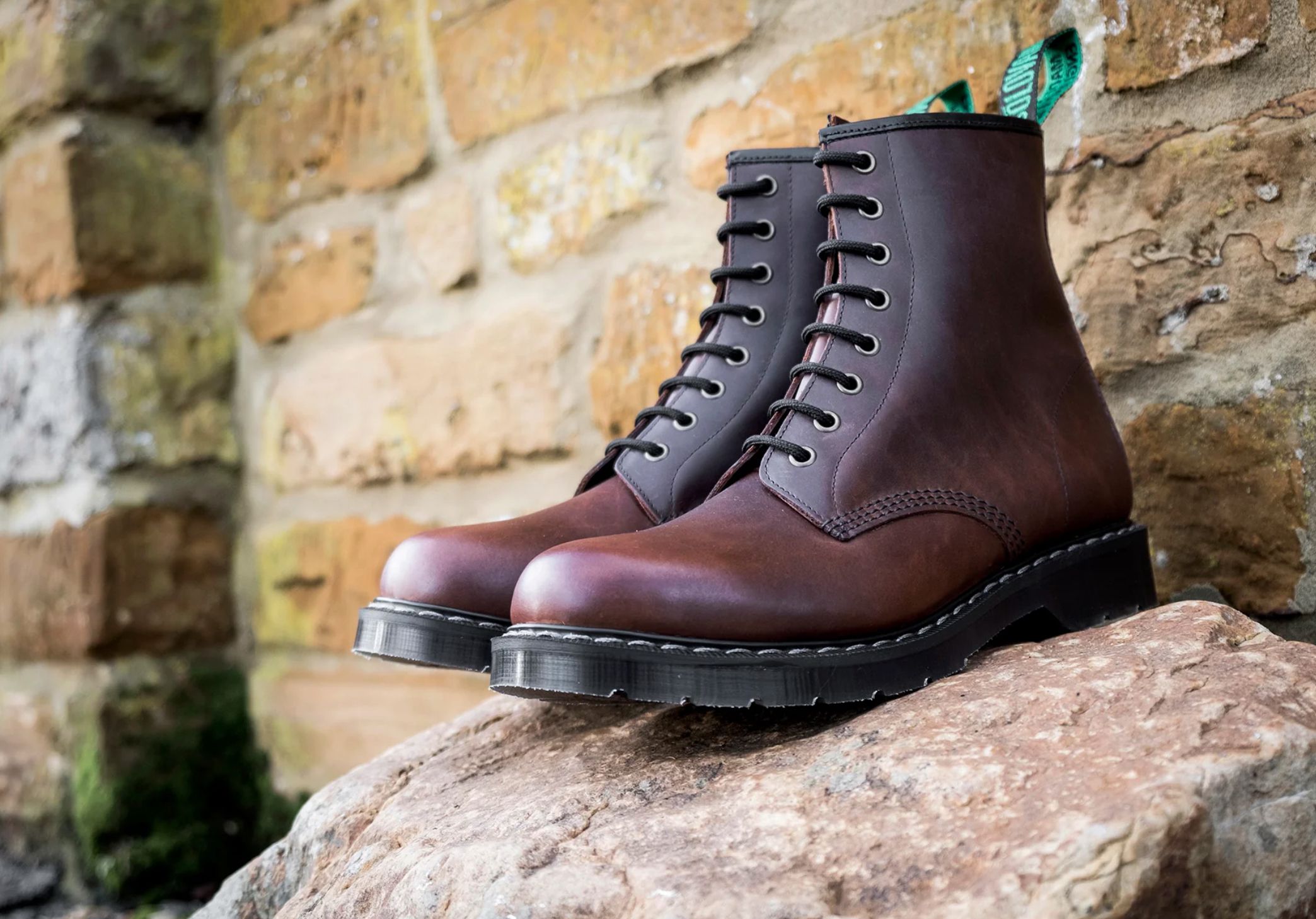 Gaucho Crazy Horse 8 Eye Derby Boot against brick background