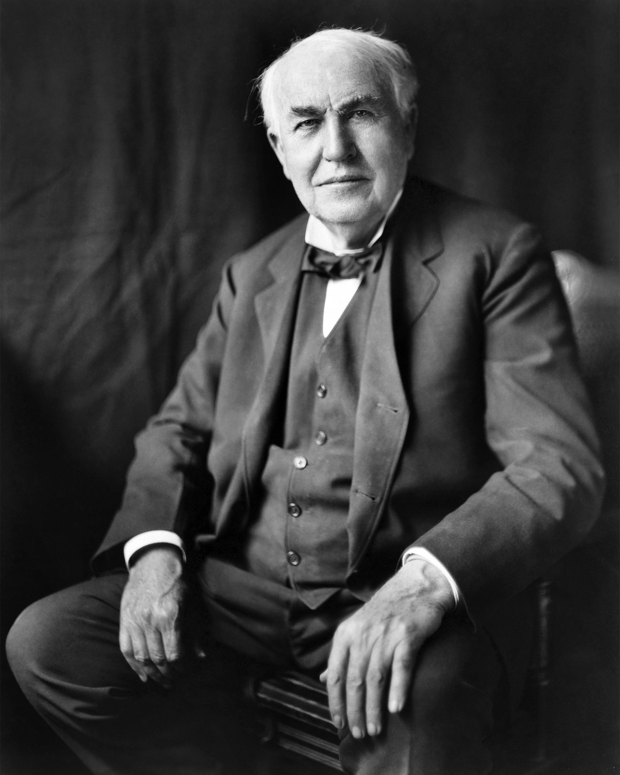 Thomas Edison, three-quarter length portrait, seated, facing front, black and white circa 1922