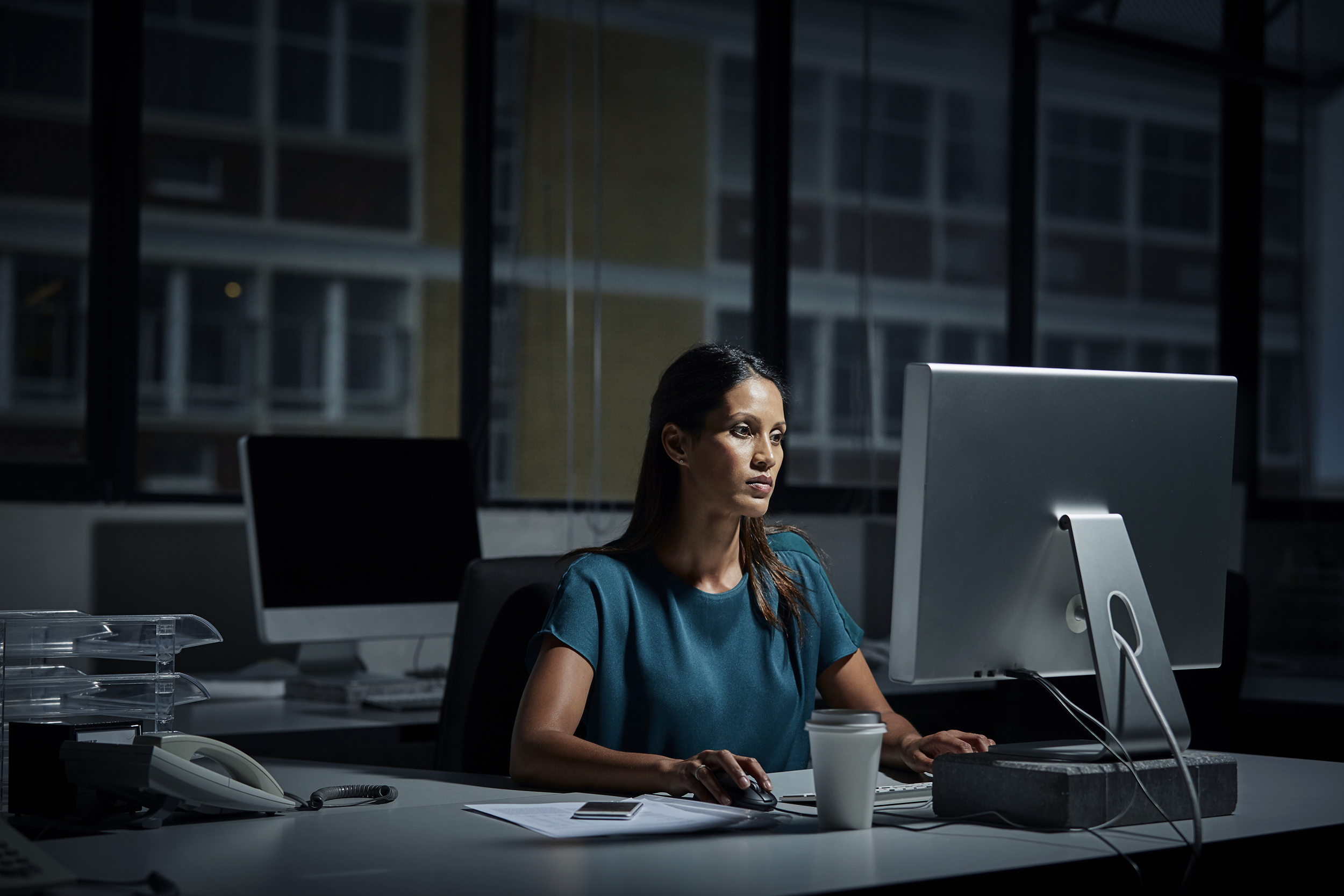 Woman working late at night