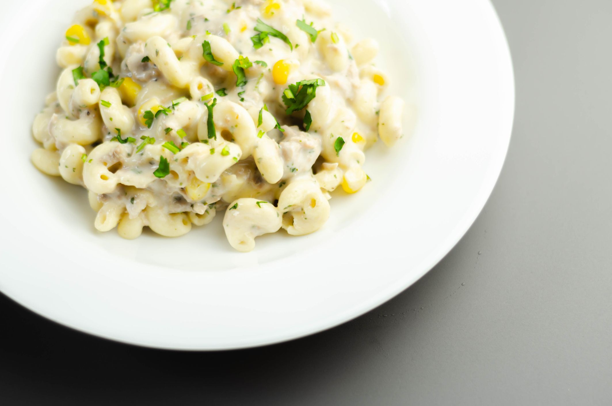 Cooked pasta with flaked tuna and sweetcorn in mayonnaise dressing, healthy salad