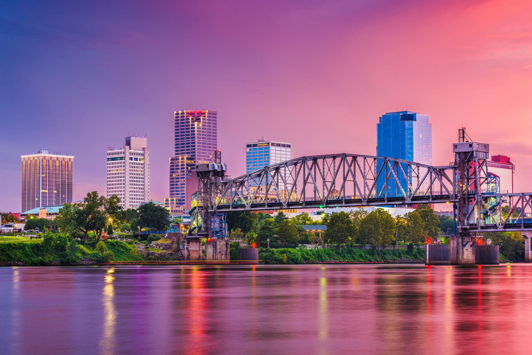 Little Rock, Arkansas, USA skyline on the river at twilight.