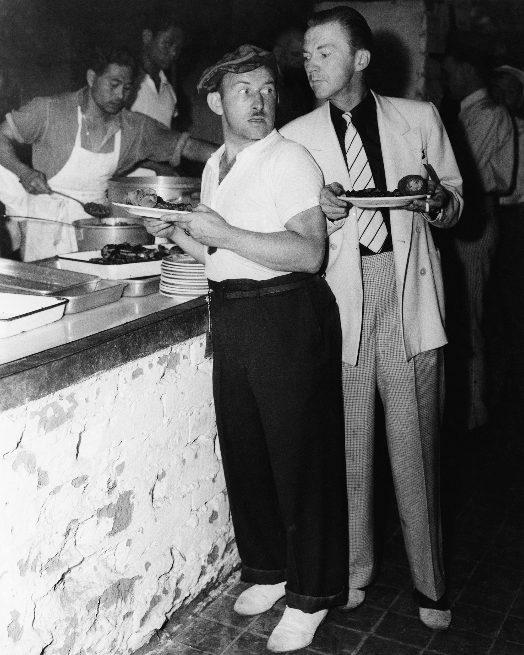 men in food line