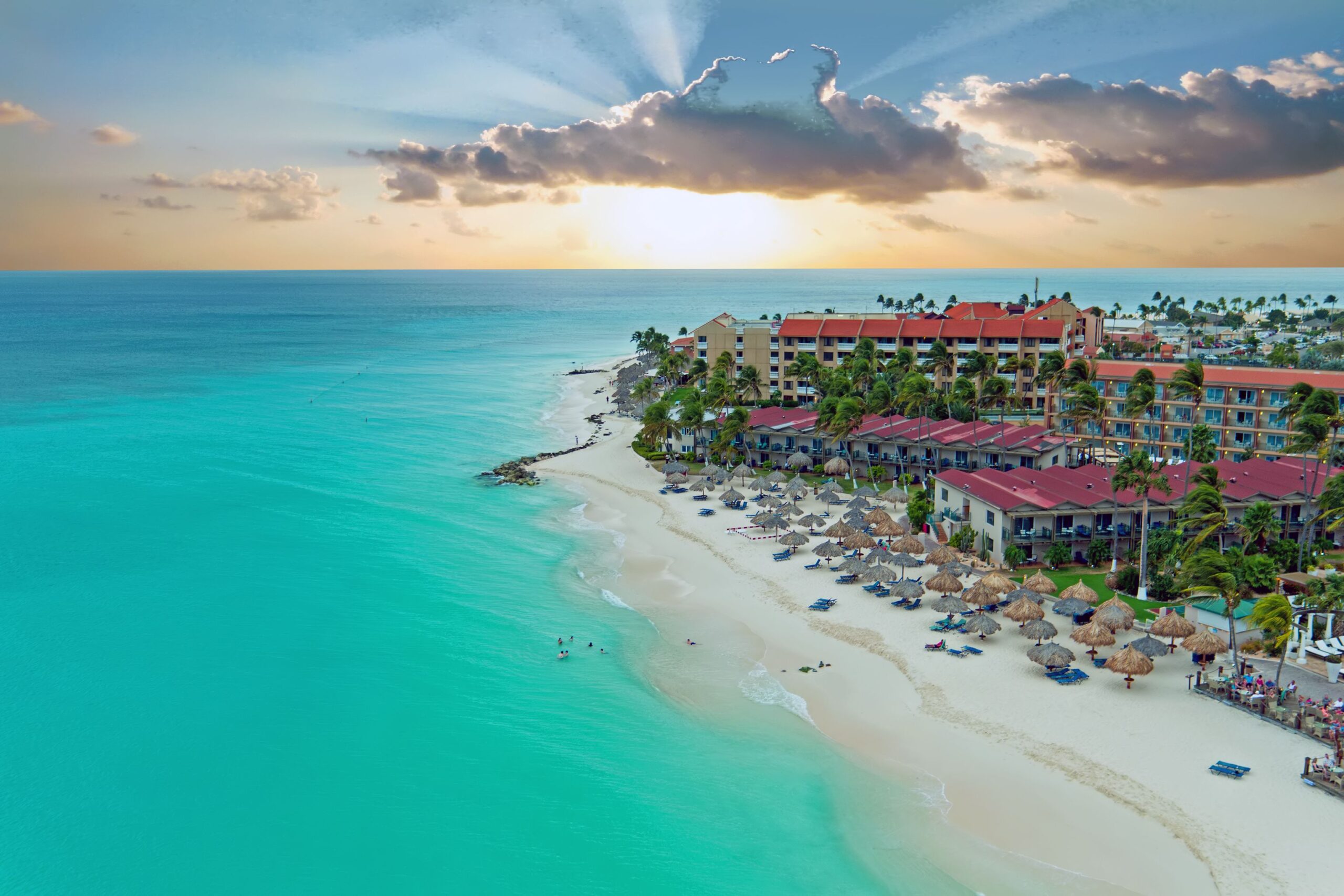 Aerial of Manchebo Beach, Aruba Island during sunset