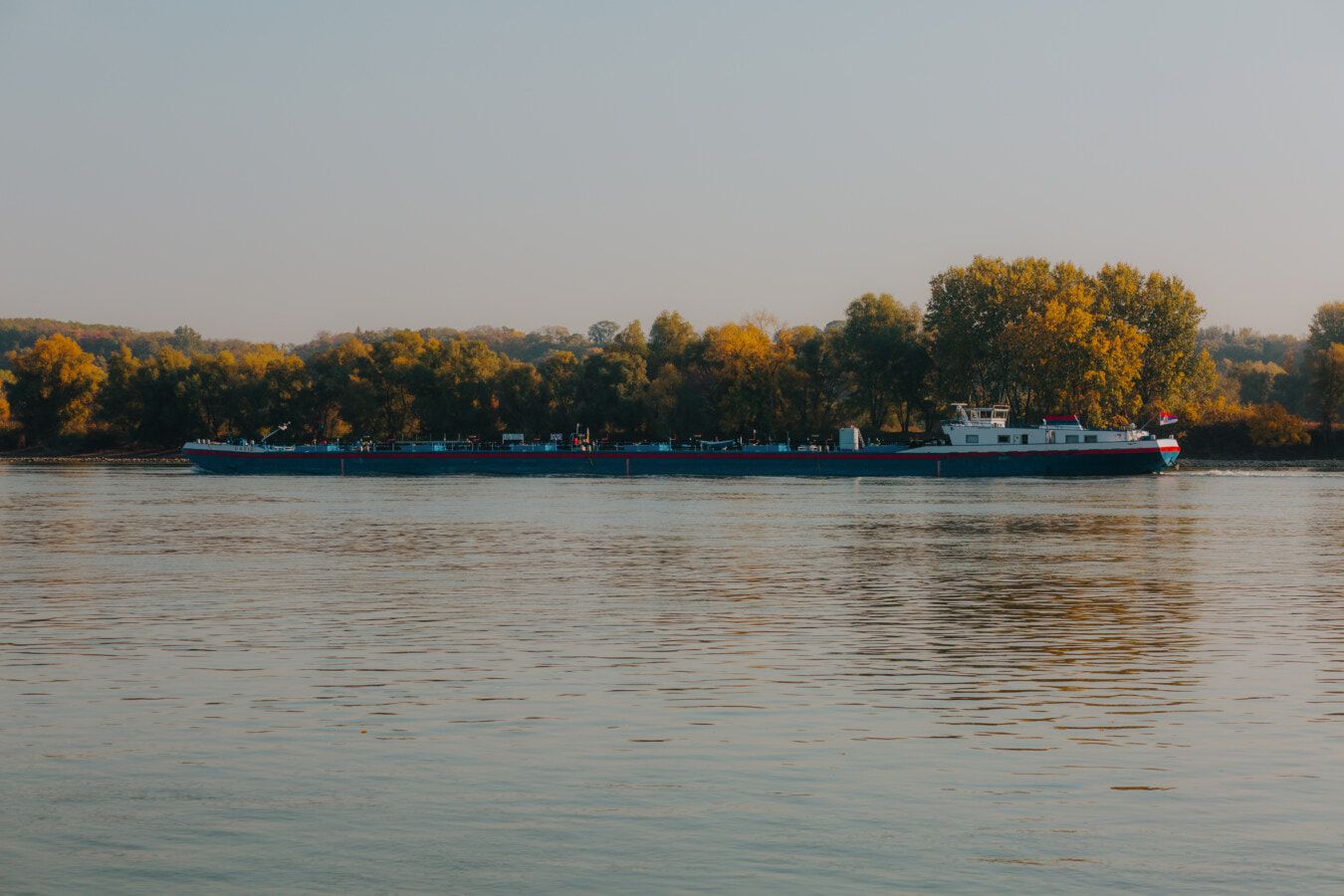 Barge on River Danube on an overcast day.
