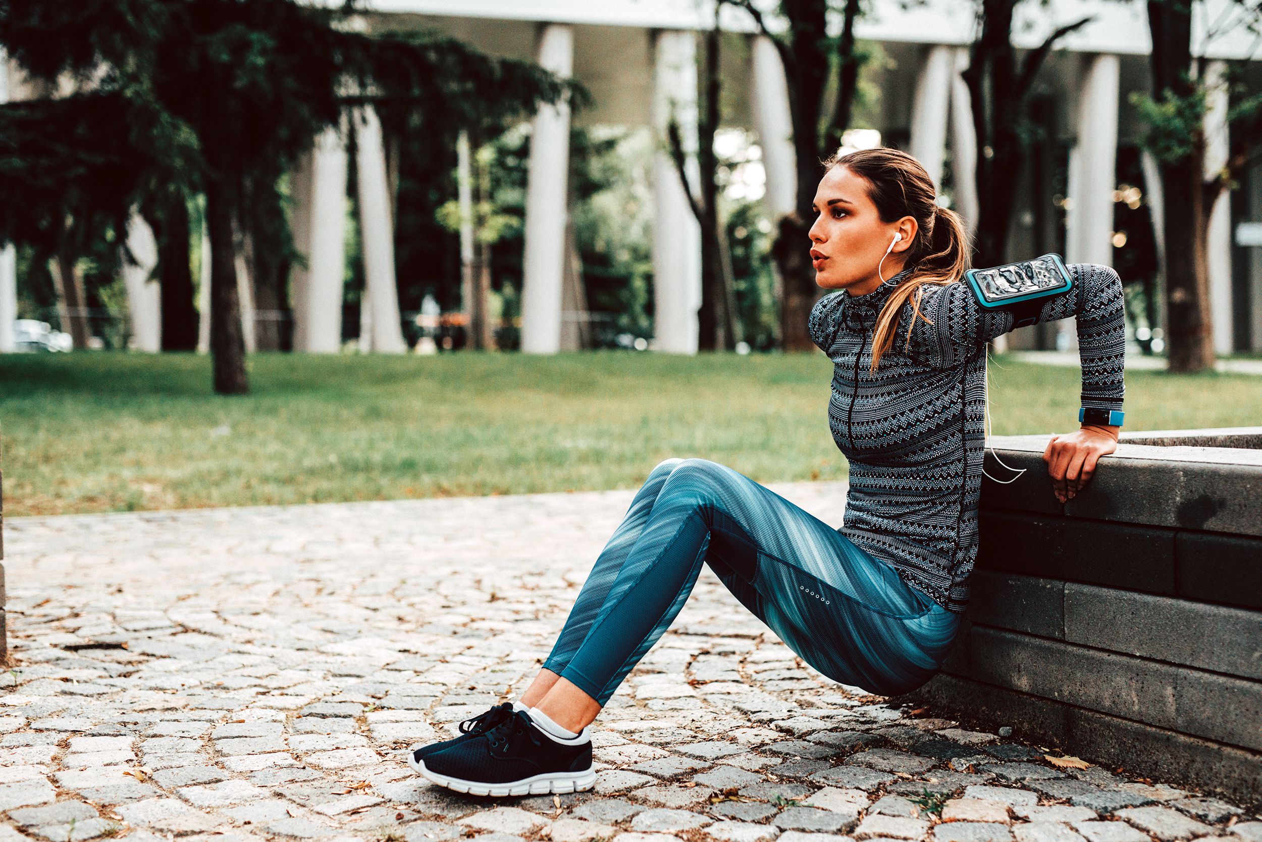 Woman doing dips outside
