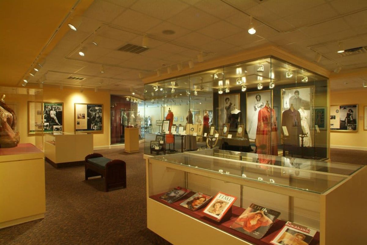 Exhibits inside Ava Gardner Museum, Smithfield, North Carolina, clothing, magazine covers and photos, classy interior brightly lit