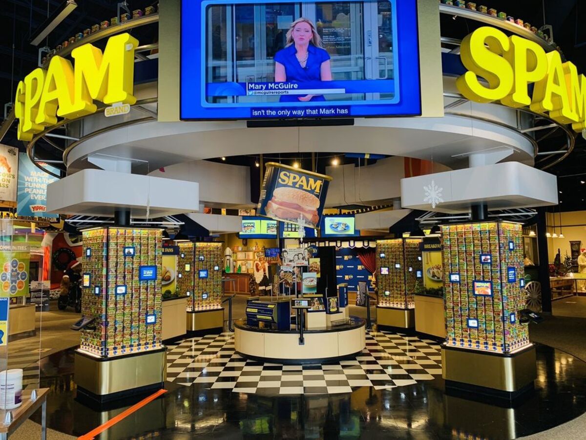 Inside SPAM Museum, Austin, Minnesota, circular exhibit showcasing hundreds of different SPAM cans, surrounded by other SPAM exhibits