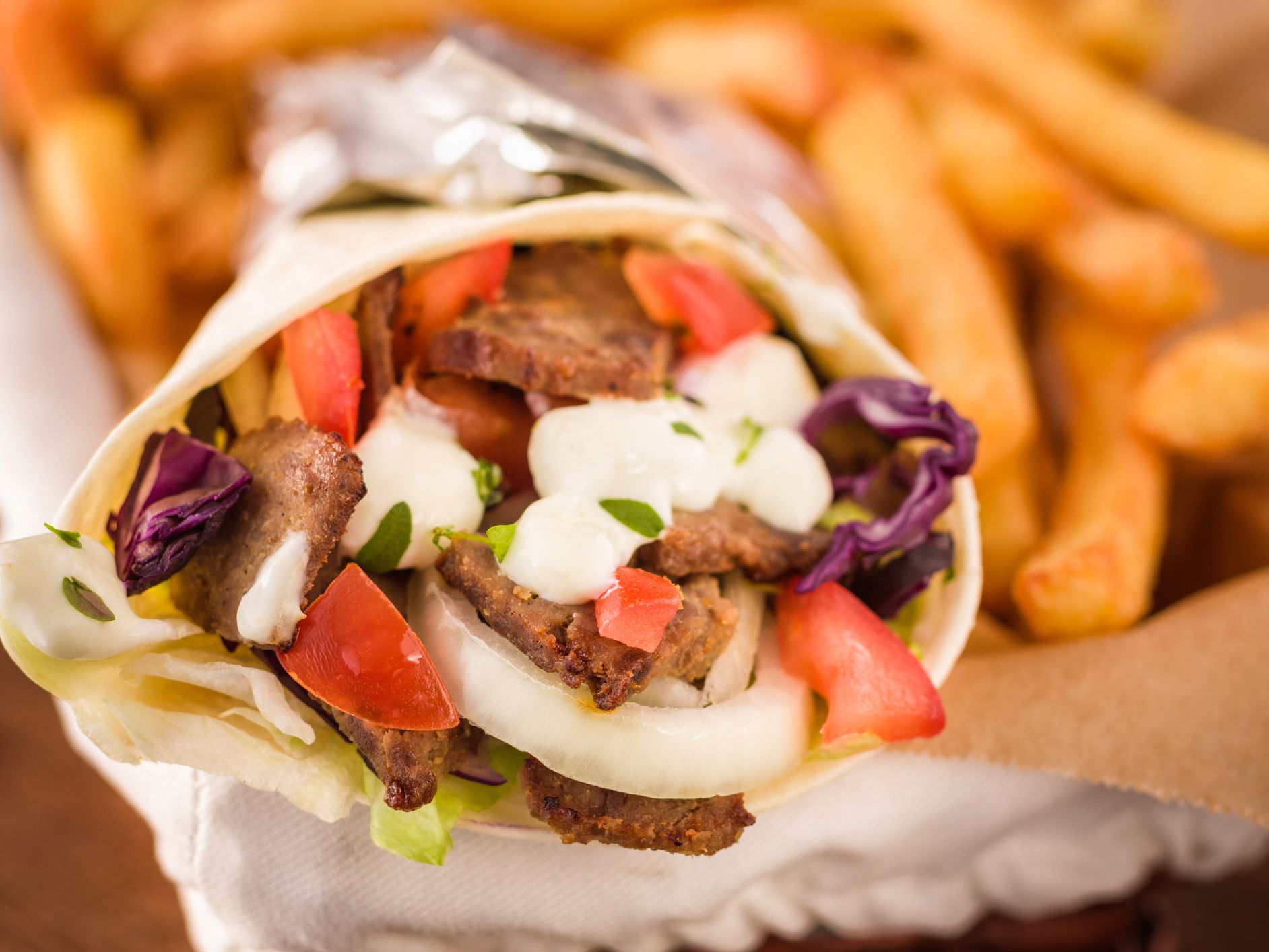 Doner kebab sandwich with french fries