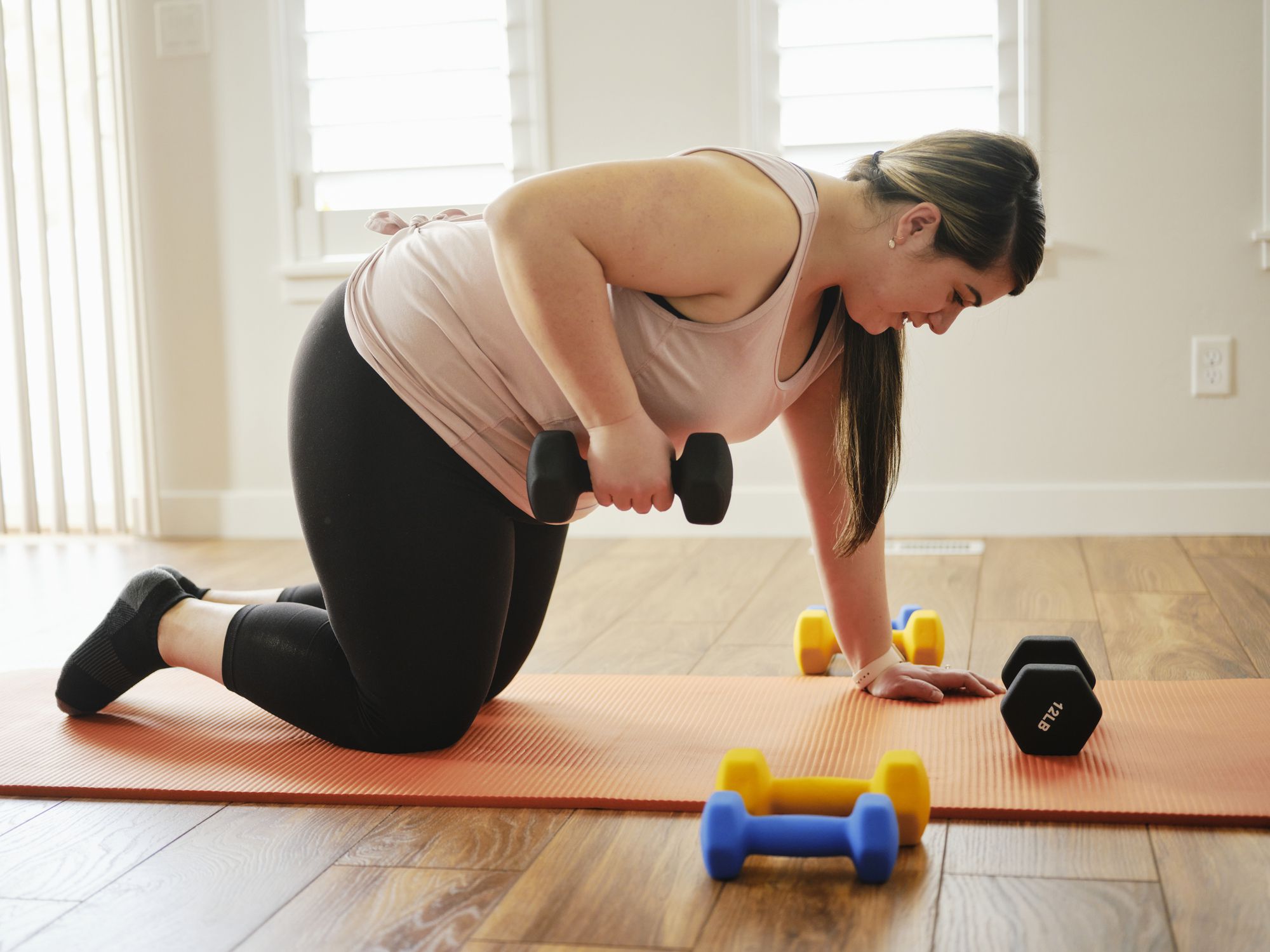 woman with dumbbells
