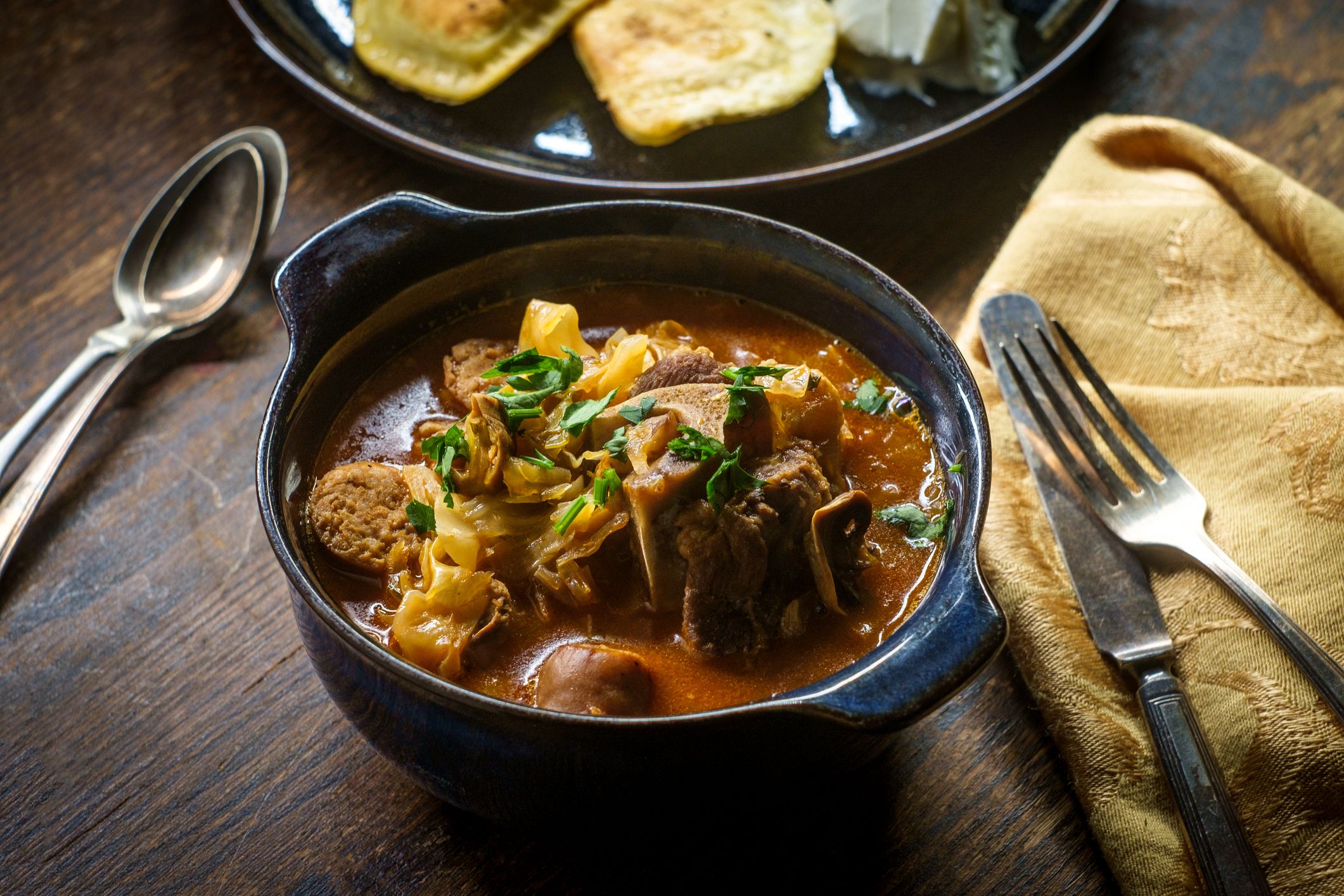 Polish hunters stew known as Bigos with pork loin sausage and lamb neck