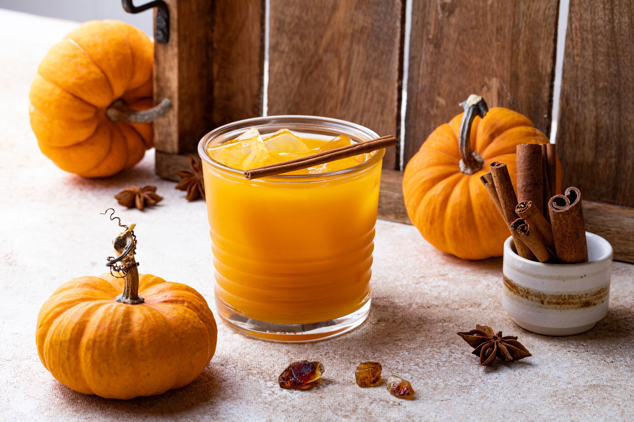 Fall pumpkin spice Old Fashioned cocktail with cinnamon or spiced bourbon smash