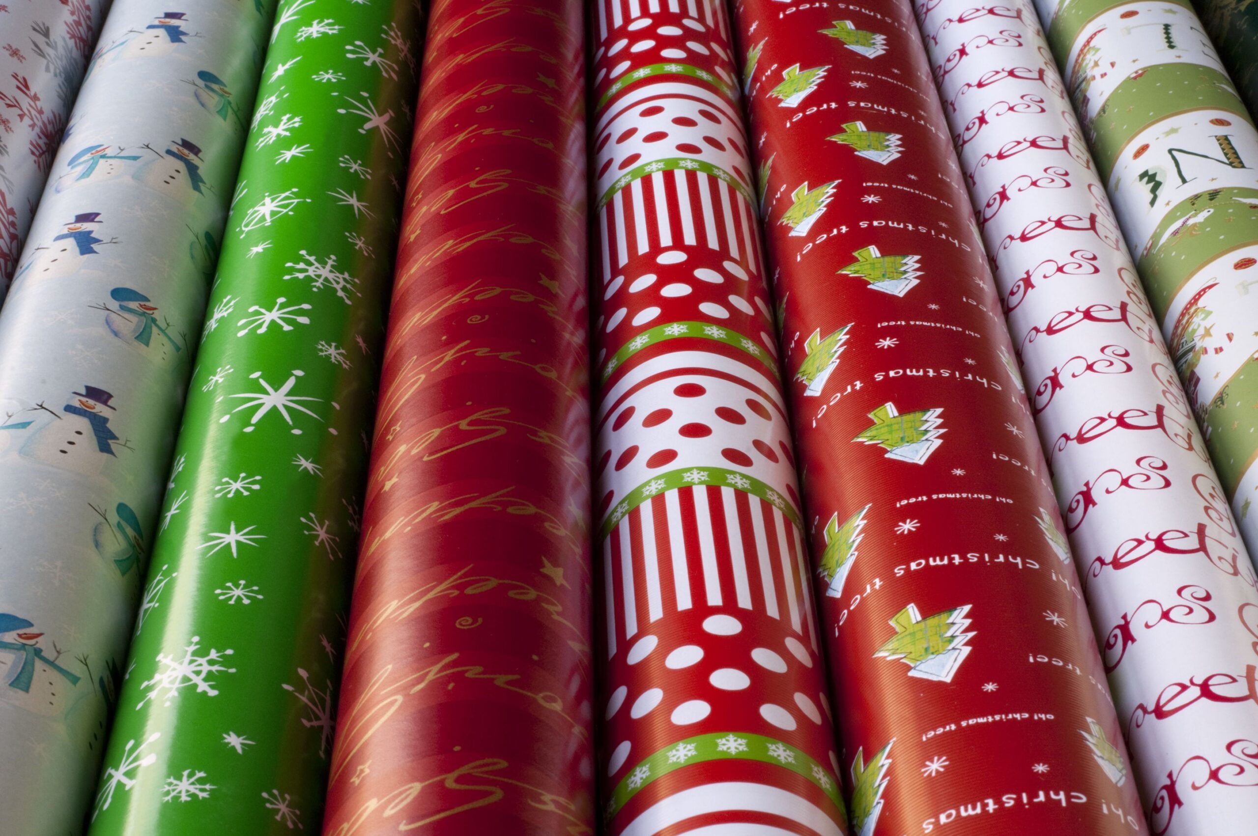 Rows of Christmas gift wrap paper: More Christmas: