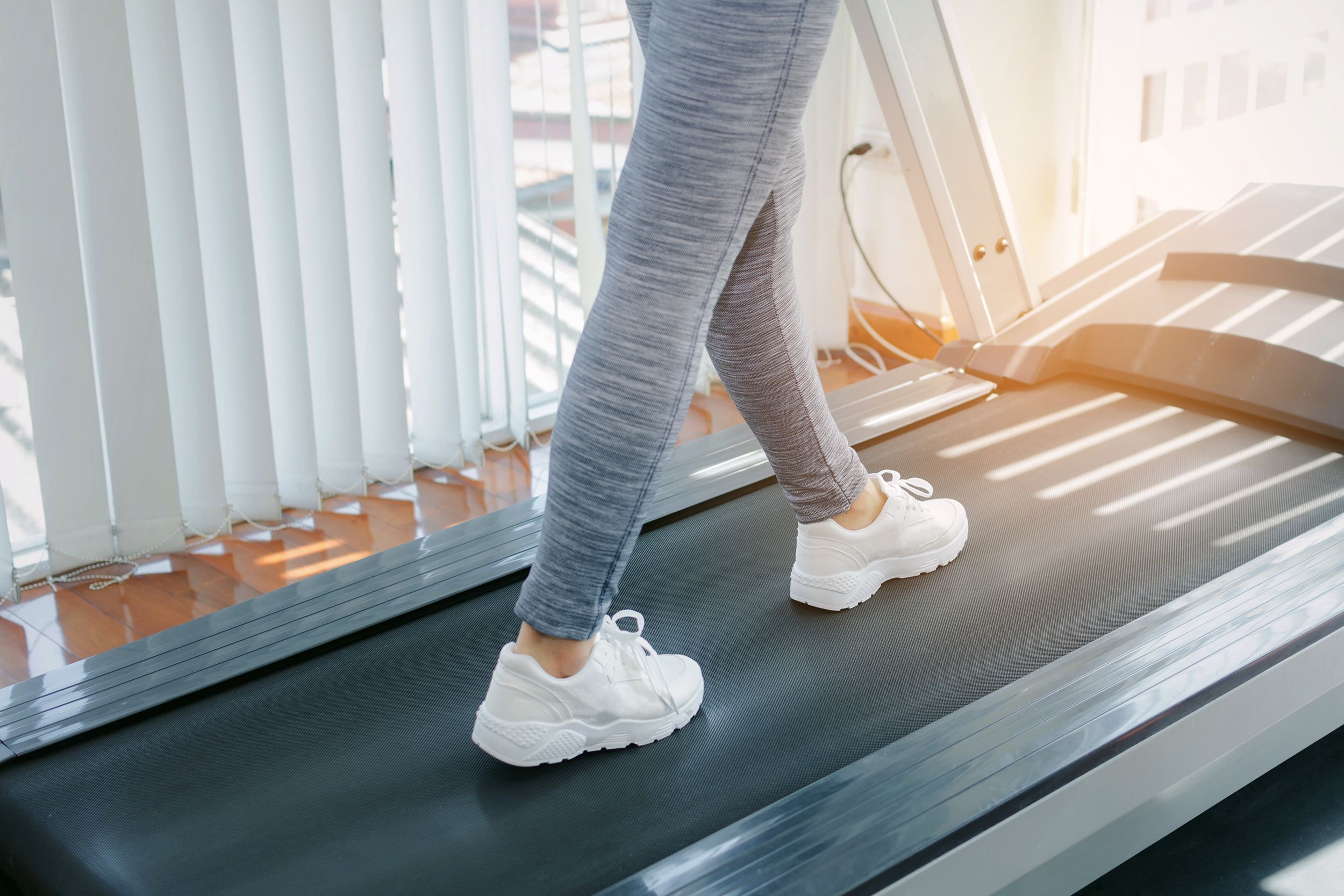 woman on a treadmill at home