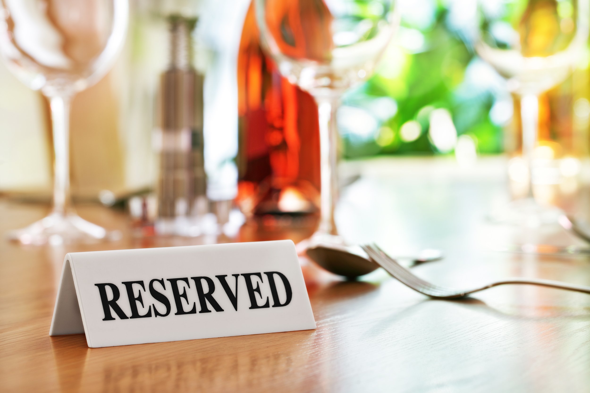 reserved sign on a restaurant table
